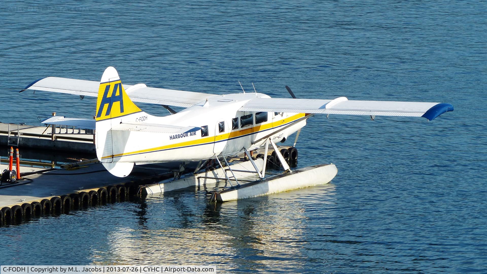C-FODH, 1952 De Havilland Canada DHC-3T Vazar Turbine Otter Otter C/N 3, Harbour Air #307 tied up at terminal.
