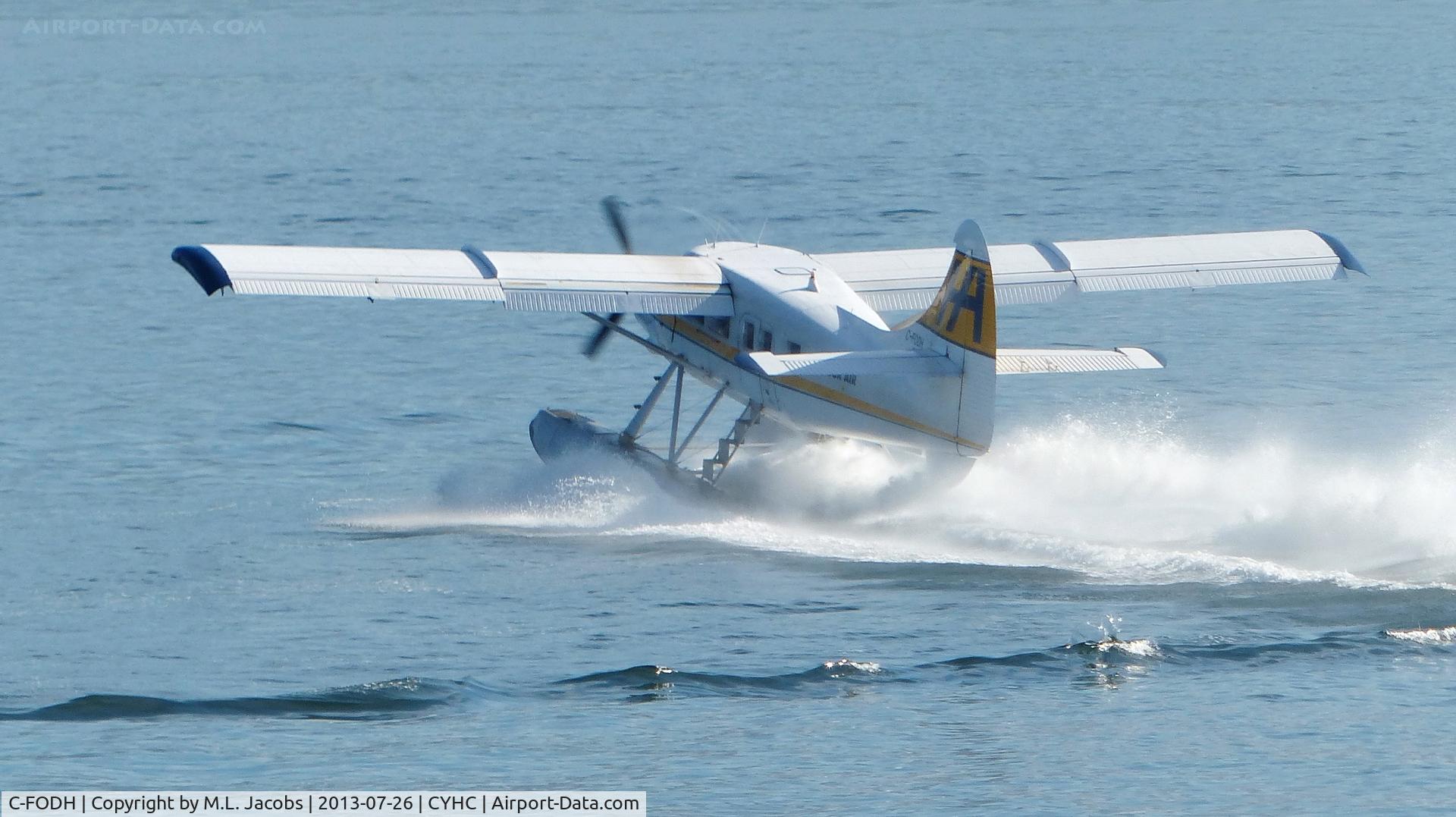 C-FODH, 1952 De Havilland Canada DHC-3T Vazar Turbine Otter Otter C/N 3, Harbour Air #307 taking off in Coal Harbour.