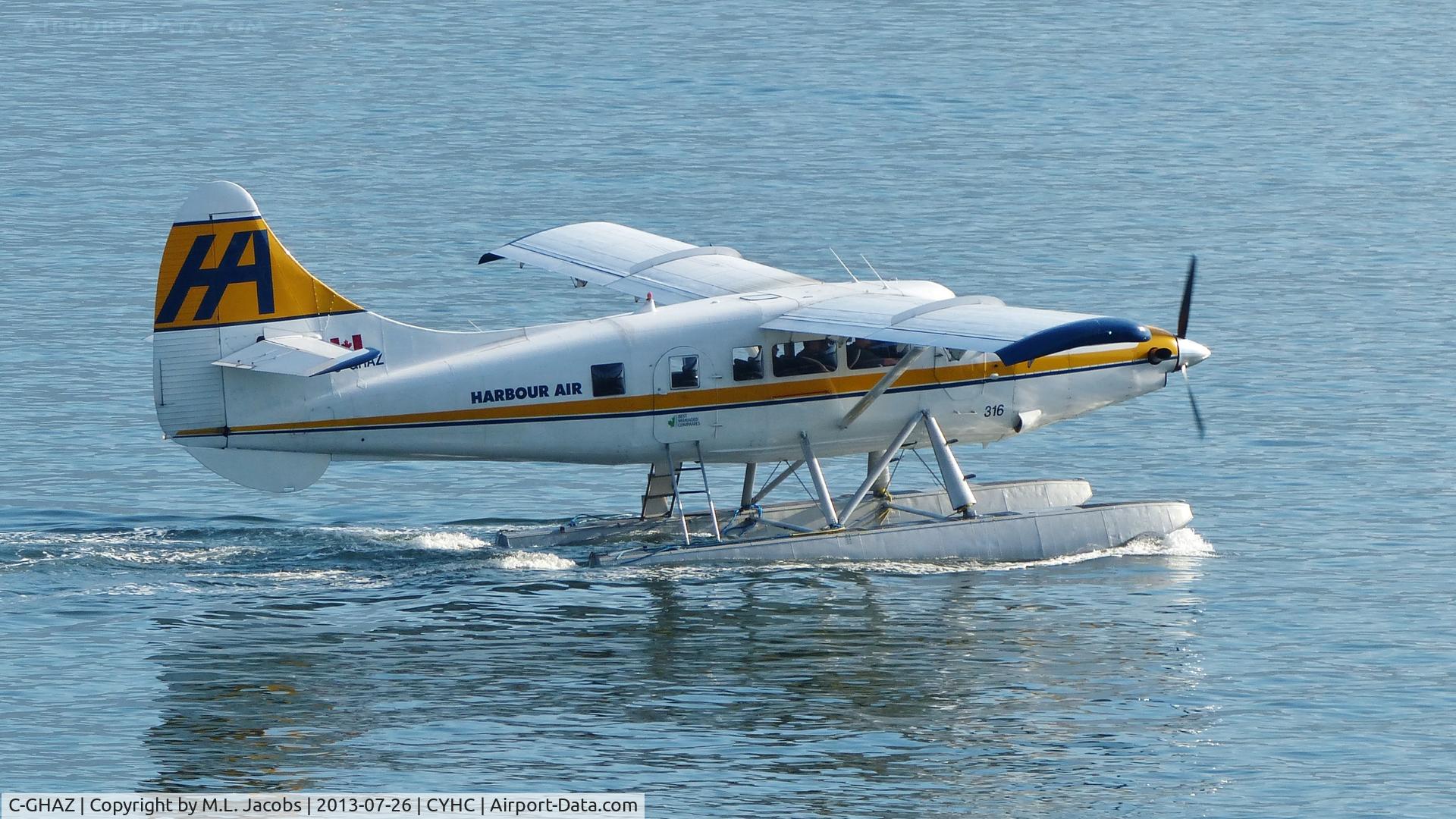 C-GHAZ, 1953 De Havilland Canada DHC-3 Otter C/N 19, Harbour Air #316 taxiing to takeoff position in Coal Harbour.