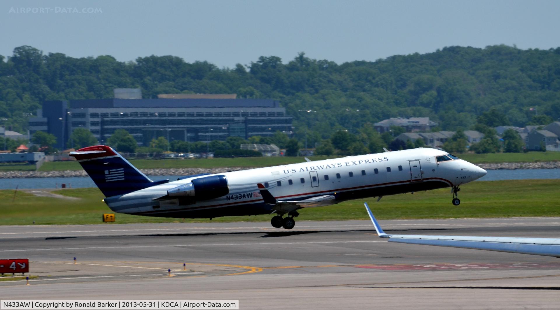 N433AW, 1999 Canadair CRJ-200LR (CL-600-2B19) C/N 7289, Takeoff DCA