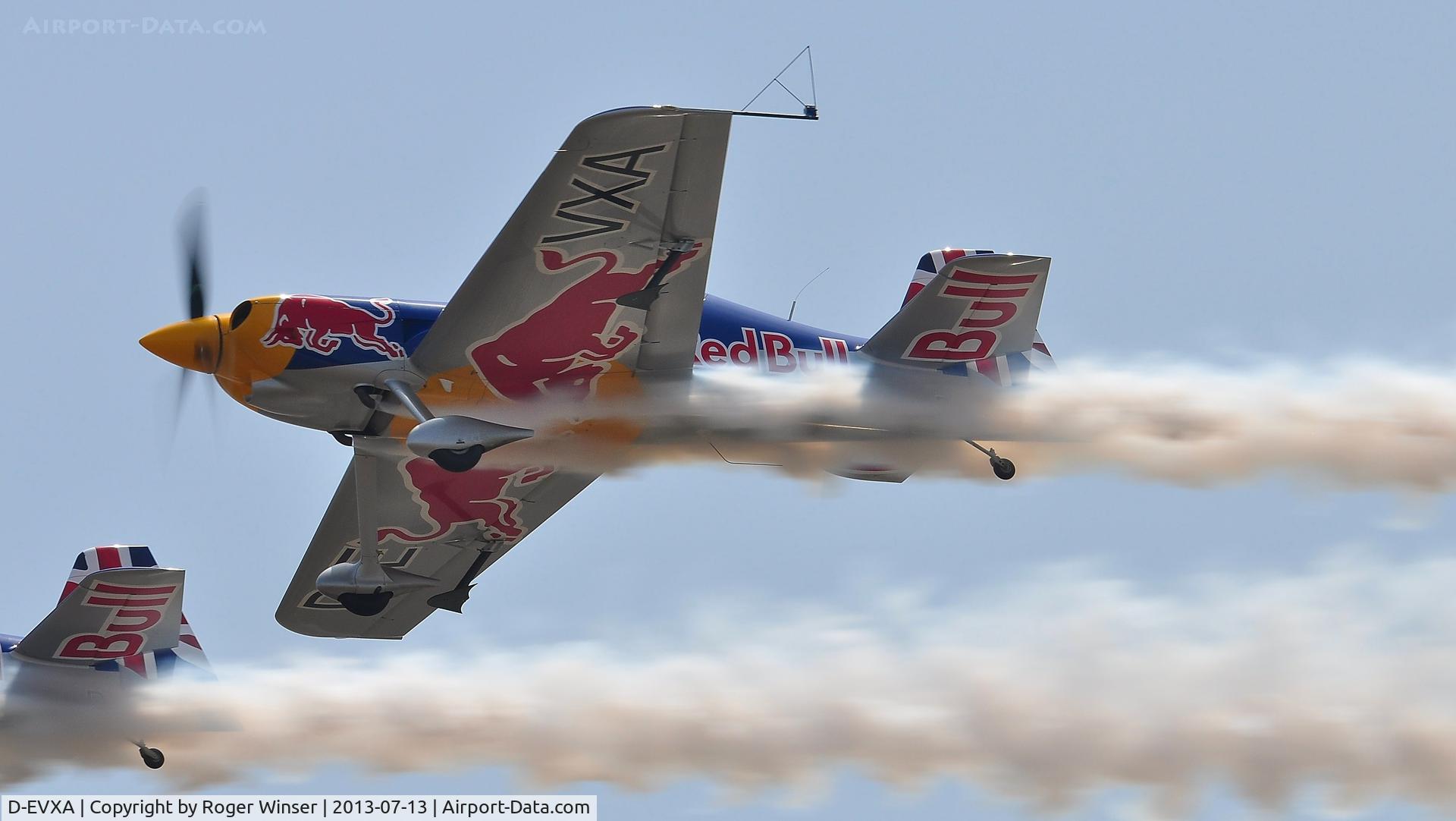 D-EVXA, 2010 XtremeAir XA-41 Sbach 300 C/N 01, Off airport. Red Bull Matadors. D-EVXA displaying with D-EYXA on the first day of the Wales National Air Show, Swansea Bay, UK.