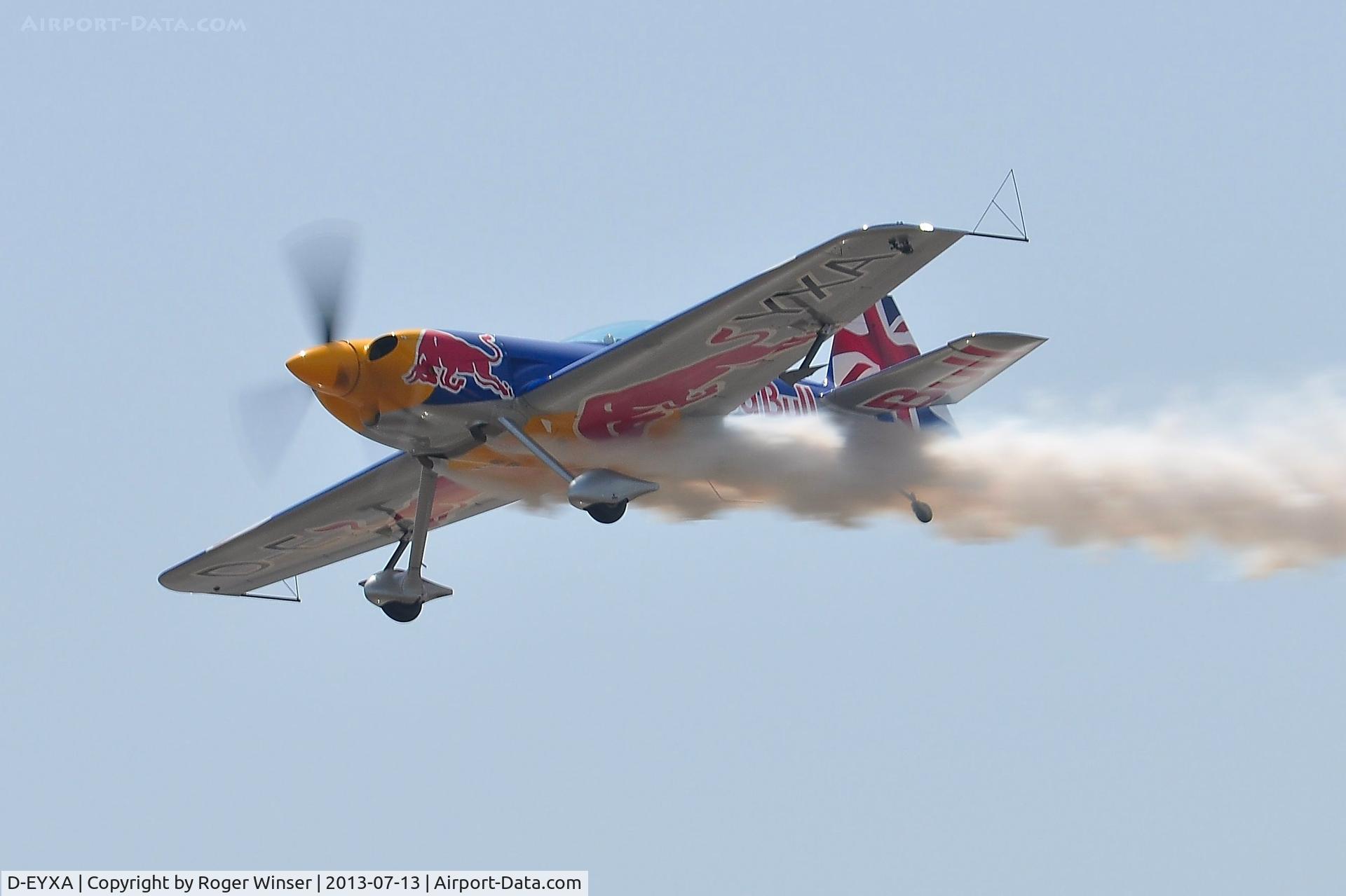 D-EYXA, 2011 XtremeAir XA-41 Sbach 300 C/N 002, Off airport. Red Bull Matadors. D-EYXA displaying with D-EVXA on the first day of the Wales National Air Show, Swansea Bay, UK