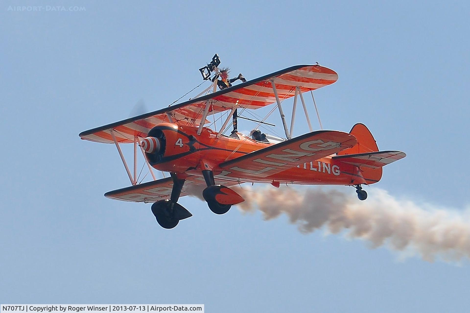 N707TJ, 1943 Boeing A75N1(PT17) C/N 75-950, Off airport. Breitling 4, half of the Breitling Wingwalking team displaying on the first day of the Wales National Air Show, Swansea Bay, UK.