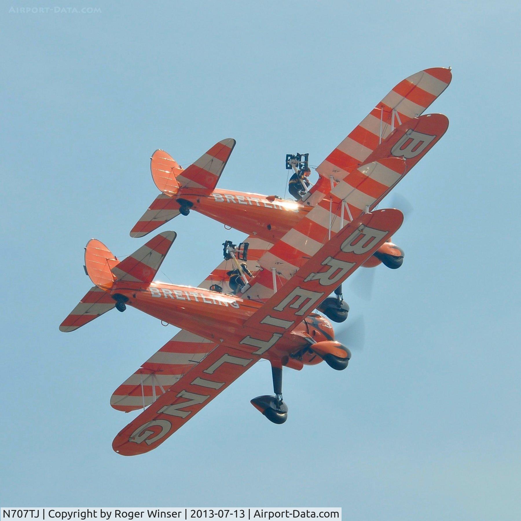 N707TJ, 1943 Boeing A75N1(PT17) C/N 75-950, Off airport. Breitling 4 (N707TJ) leading the  two ship formation of the Breitling Wingwalking team displaying on the first day of the Wales National Air Show, Swansea Bay, UK.