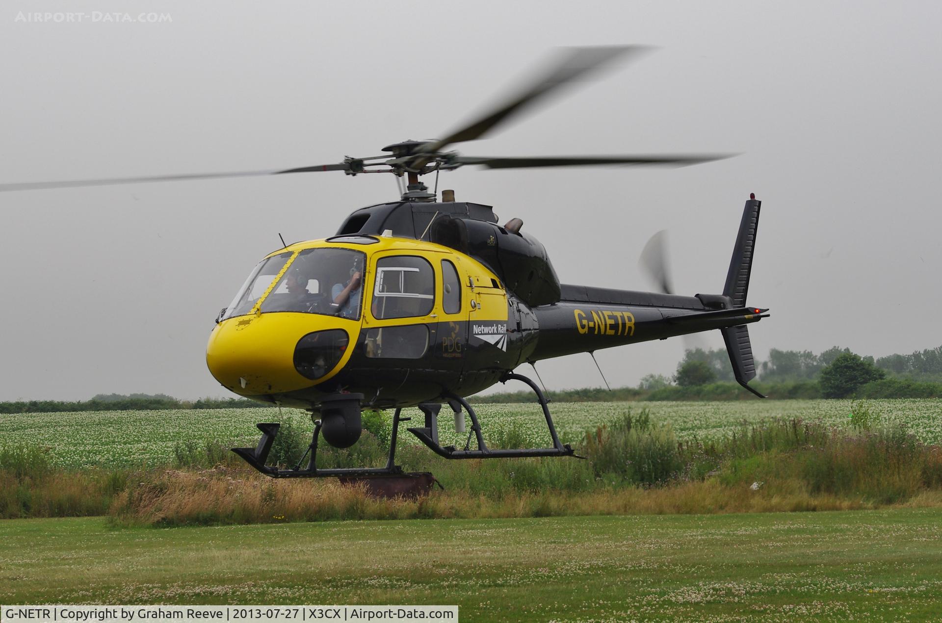 G-NETR, 1982 Aerospatiale AS-355F-1 Ecureuil 2 C/N 5164, Departing from Northrepps.