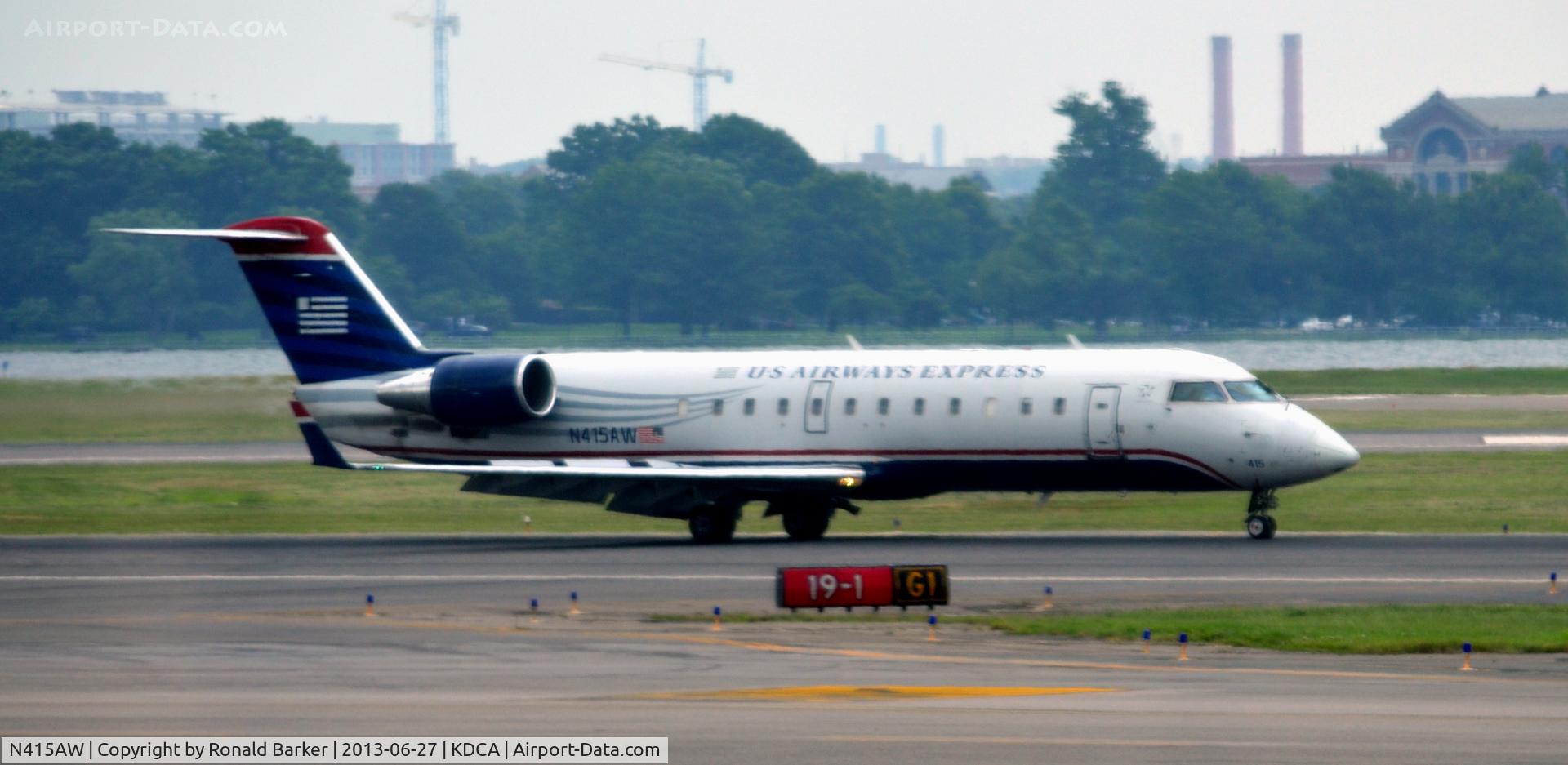 N415AW, 2001 Bombardier CRJ-200LR (CL-600-2B19) C/N 7593, Landing DCA