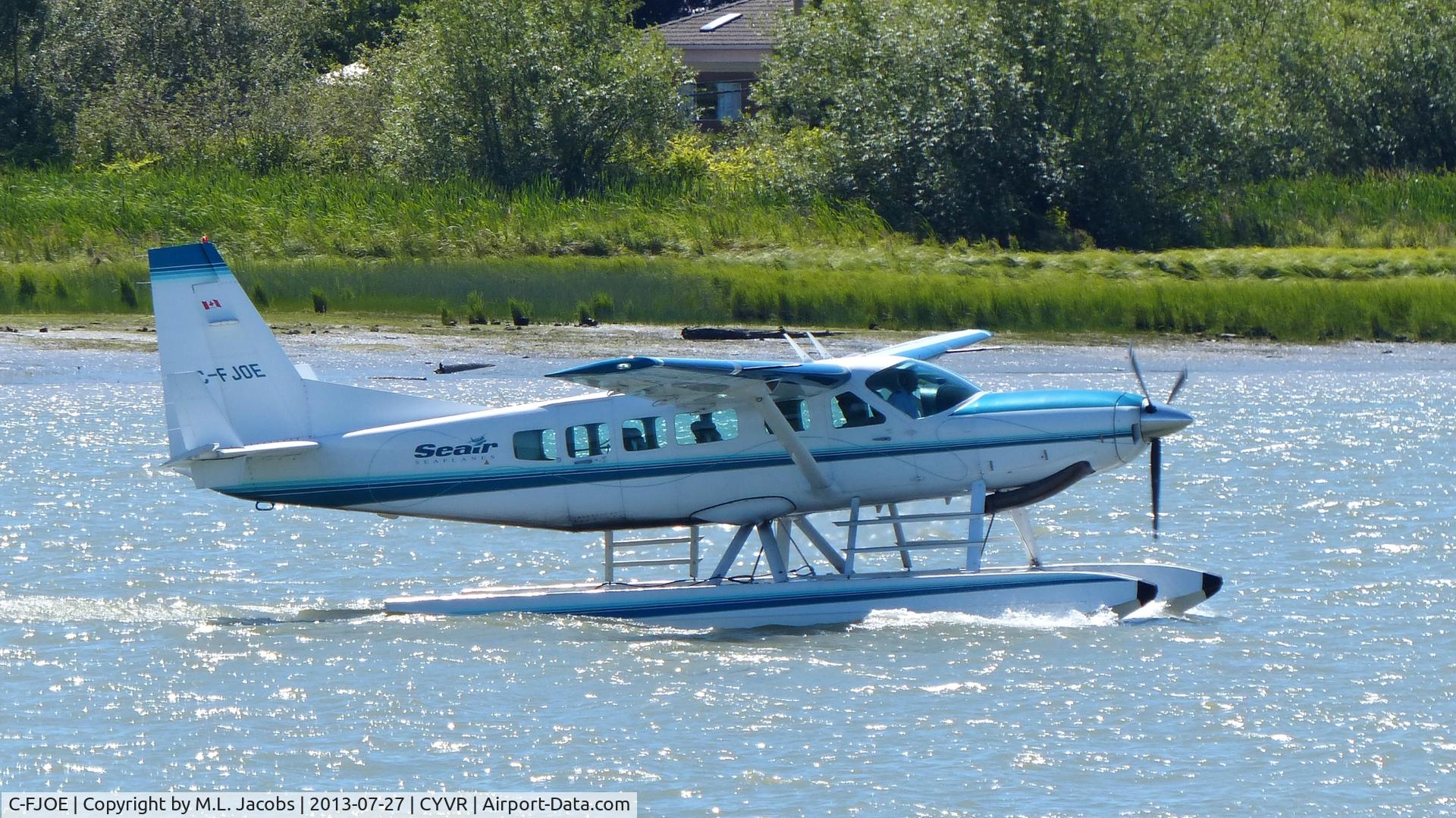 C-FJOE, 2005 Cessna 208 Caravan I C/N 20800390, Seair Seaplanes Cessna just landed on the Fraser River.