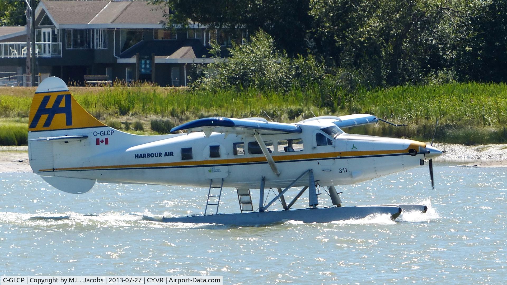 C-GLCP, 1961 De Havilland Canada DHC-3T Vazar Turbine Otter C/N 422, Harbour Air #311 taxiing to the Fraser River terminal.