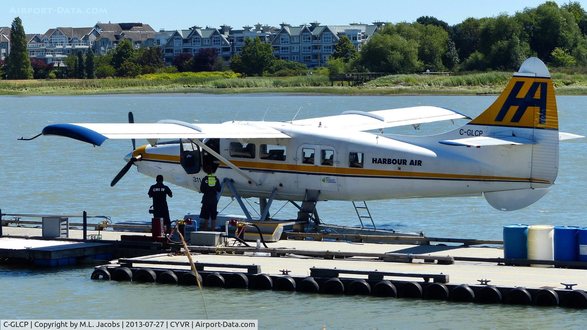 C-GLCP, 1961 De Havilland Canada DHC-3T Vazar Turbine Otter C/N 422, Harbour Air #311 being refueled at the YVR Seaplane Terminal.