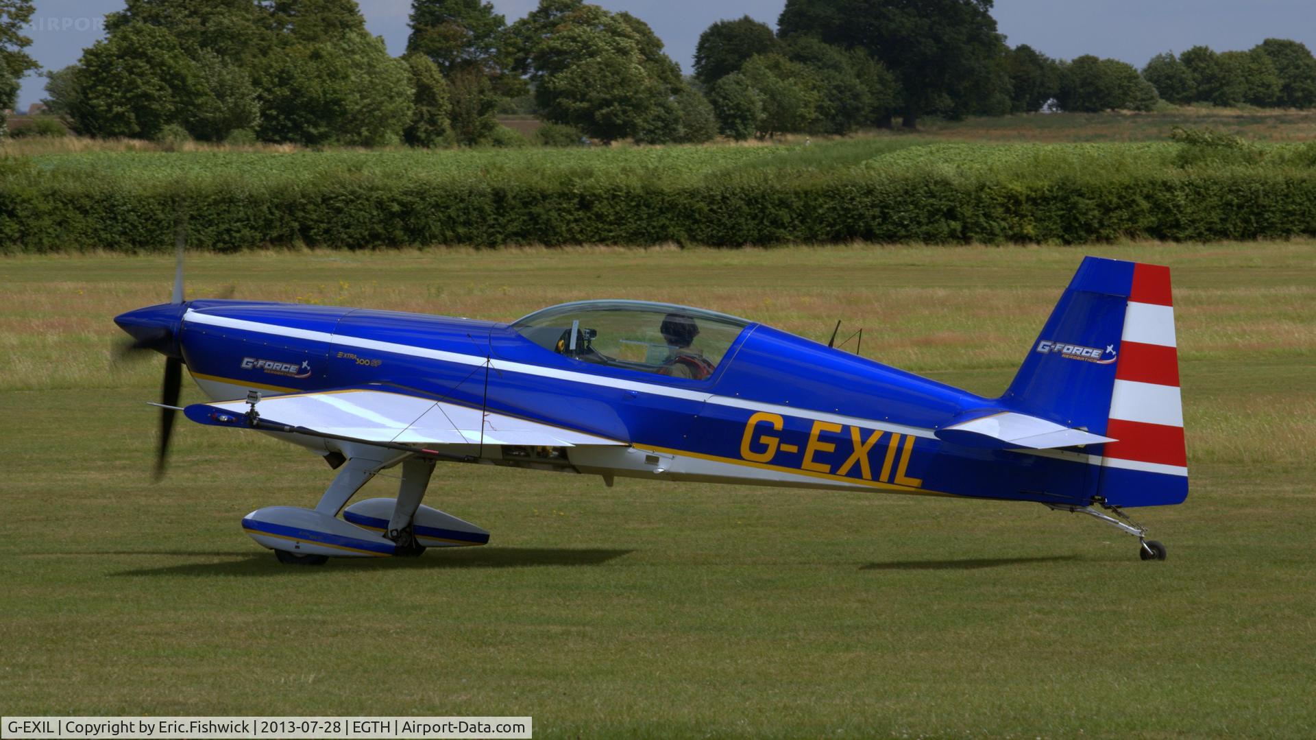 G-EXIL, 2010 Extra EA-300S C/N 1036, 1. G-EXIL at The Shuttleworth Collection Wings & Wheels Flying Day, July 2013.