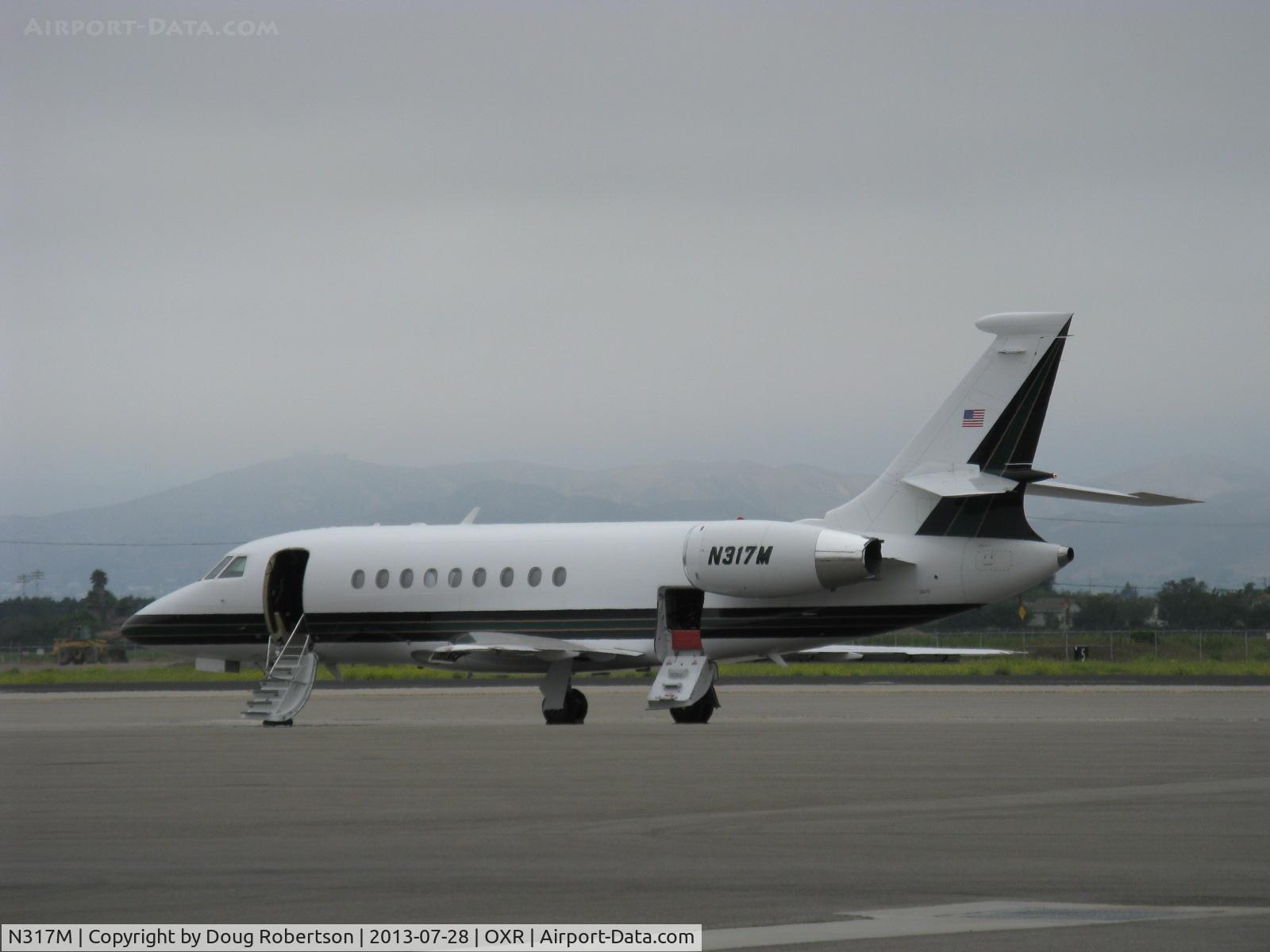 N317M, 2002 Dassault Falcon 2000 C/N 188, 2000 Dassault Aviation FALCON 2000, two CFE (General Electric & Honeywell) CFE738-1-1B Turbofans 5,918 lb st each, area rule fuselage, aux power unit in tailcone turning & burning