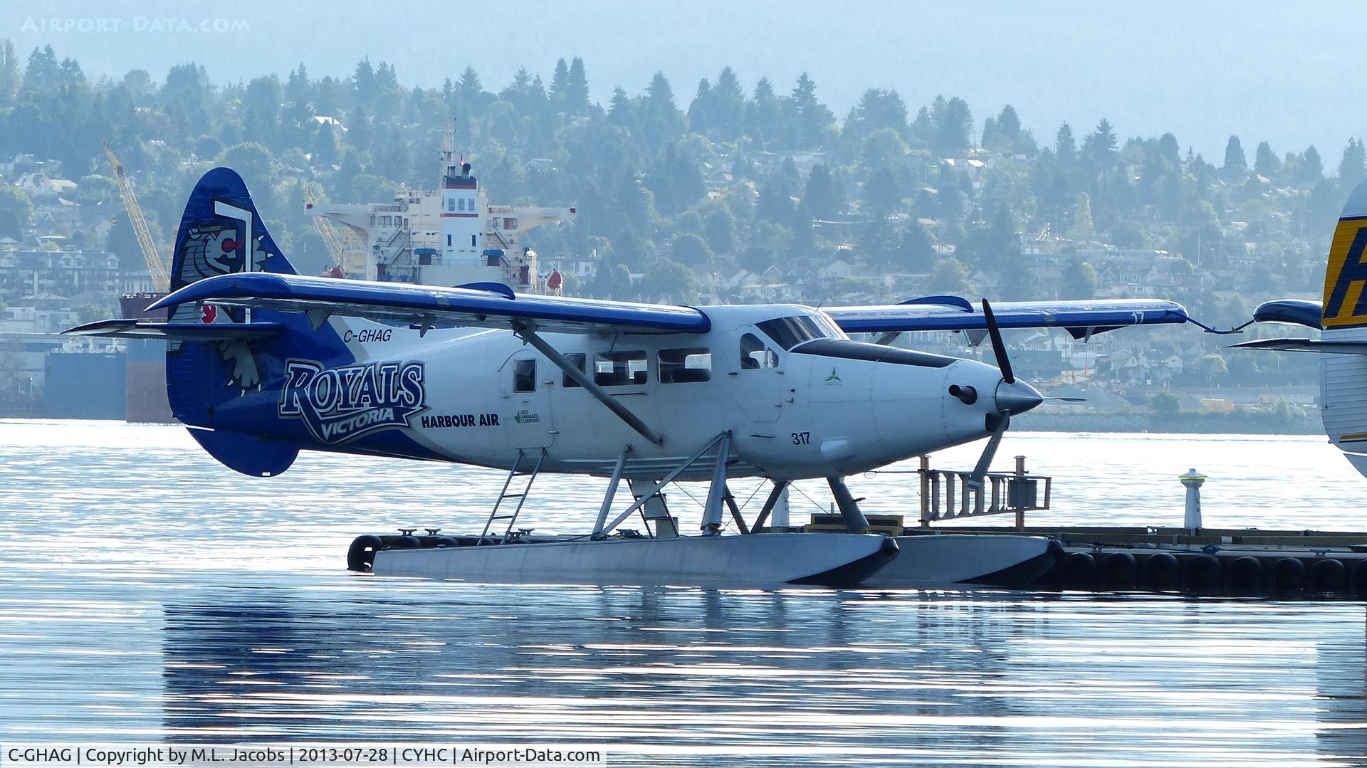 C-GHAG, 1957 De Havilland Canada DHC-3 Turbo Otter C/N 214, Harbour Air #317 tied up at Coal Harbour dock in early morning.