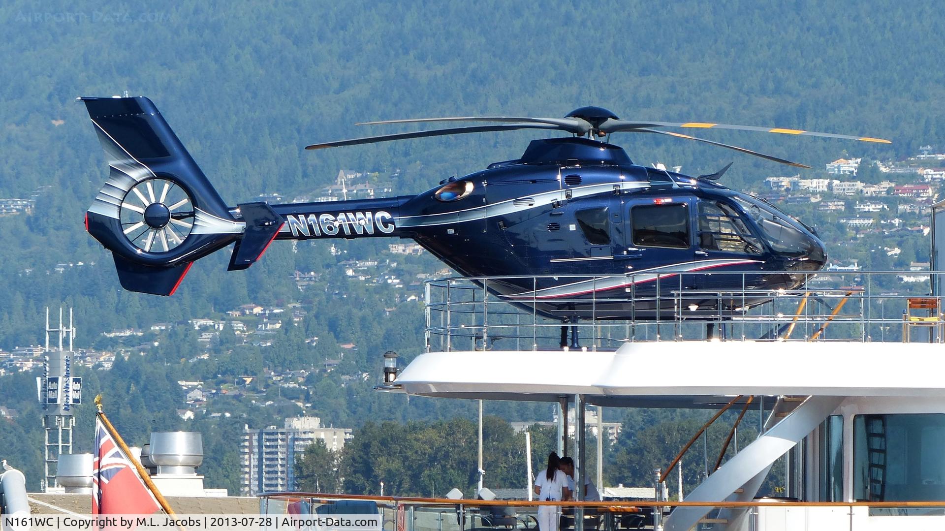 N161WC, 2012 Eurocopter EC-135T-2+ C/N 1064, Aboard the mother ship ATTESSA at SEASPAN dock beside Lonsdale Quay in North Vancouver, BC.
