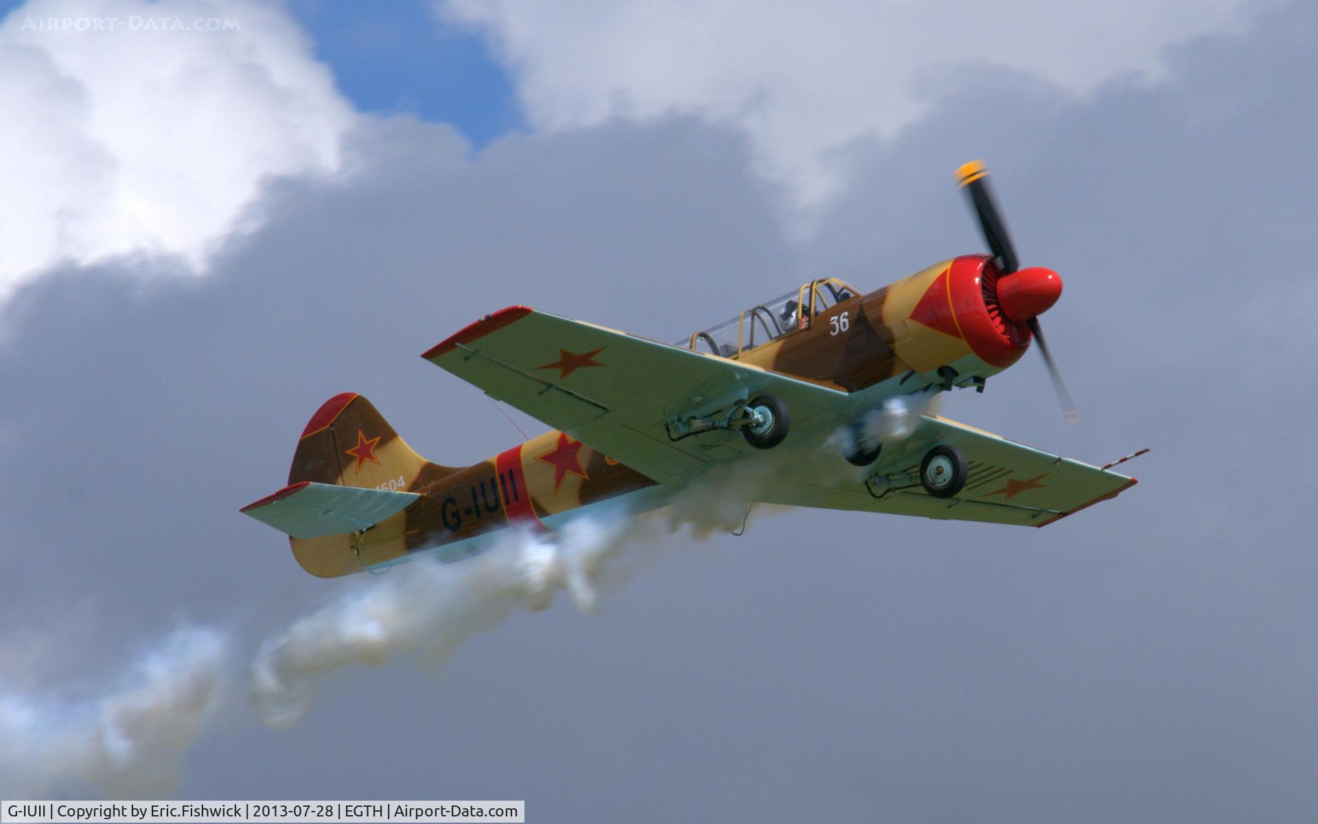 G-IUII, 1991 Yakovlev (Aerostar) Yak-52 C/N 9111604, 42. G-IUII in display mode at The Shuttleworth Collection Wings & Wheels Flying Day, July 2013.