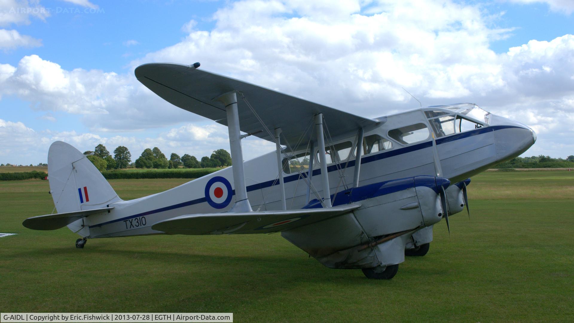 G-AIDL, 1946 De Havilland DH-89A Dominie/Dragon Rapide 6 C/N 6968, 2. TX310 at The Shuttleworth Collection Wings & Wheels Flying Day, July 2013.