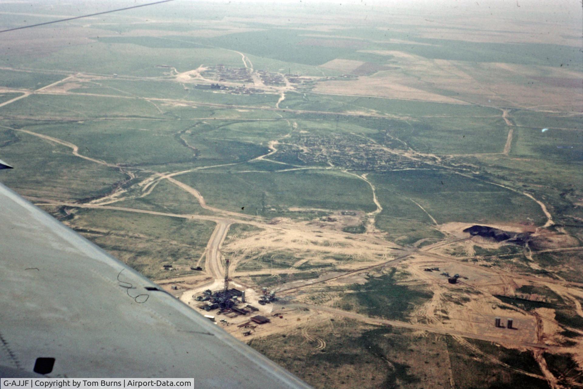 G-AJJF, 1947 De Havilland DH-104 Dove 1B C/N 04041, G-AJJF    Flying over the oilfields of Kirkuk in the 1960s