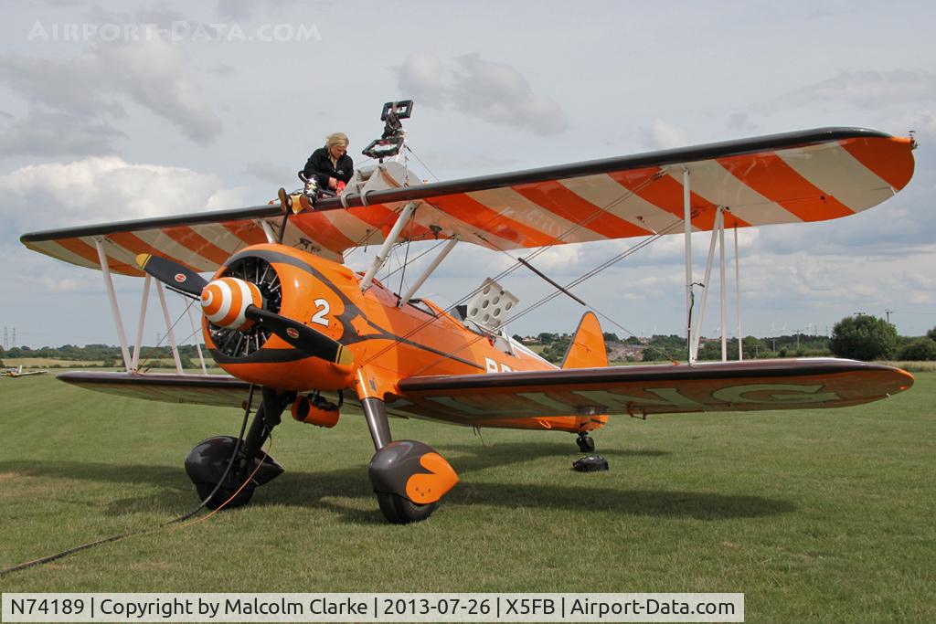 N74189, 1941 Boeing PT-17/R985 Kaydet (A75N1) C/N 75-717, Stearman PT-17-R985 Kaydet (A75N1) during a re-fuelling stop at Fishburn Airfield, July 2013.