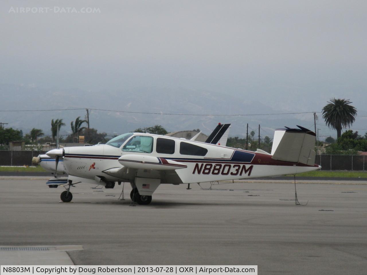 N8803M, 1964 Beech S35 Bonanza C/N D-7328, 1964 Beech S35 BONANZA, Continental IO-520-B 285 Hp, cute pinup on the cowl