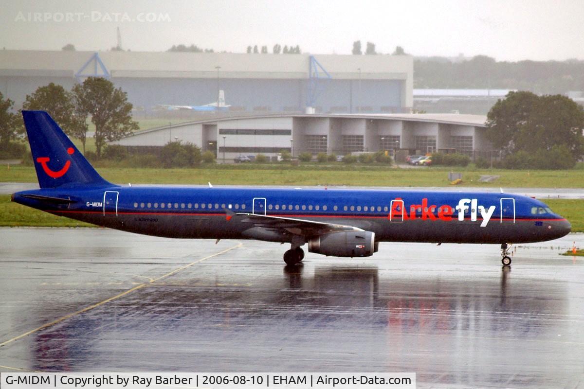 G-MIDM, 2000 Airbus A321-231 C/N 1207, Airbus A321-231 [1207] (Arkefly) Amsterdam-Schiphol~PH 10/08/2006. Taken during a rainstorm.