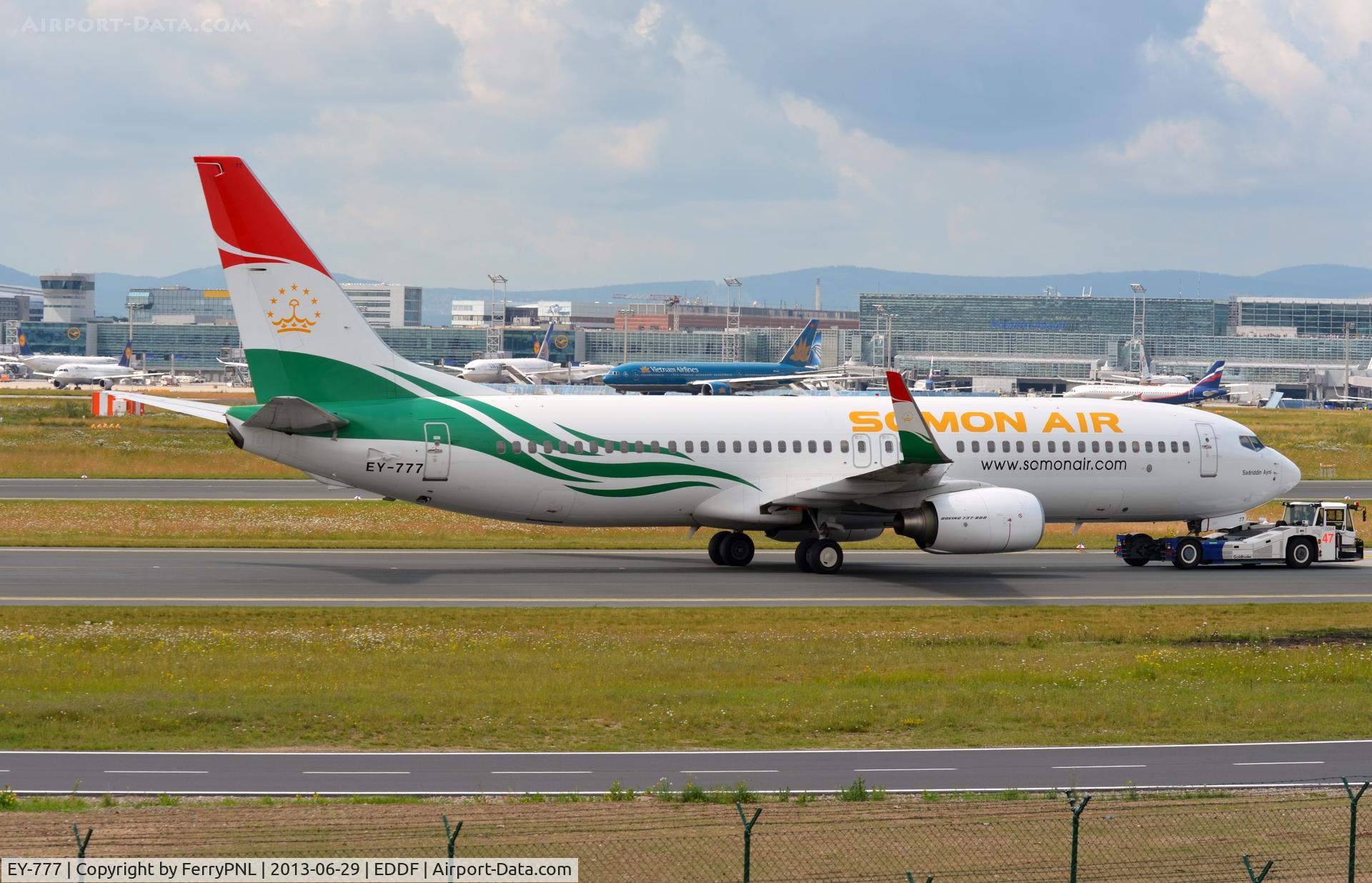 EY-777, 2009 Boeing 737-8GJ C/N 34960, Somon Air B738 towed to gate.