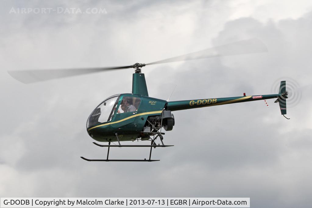 G-DODB, 1988 Robinson R22 Beta C/N 0911, Robinson R22 Beta at The Real Aeroplane Company's Wings & Wheels Fly-In, Breighton Airfield, July 2013.
