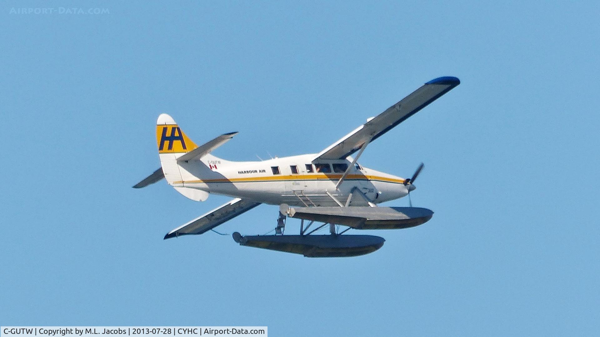 C-GUTW, 1960 De Havilland Canada DHC-3 Turbo Otter Otter C/N 405, Harbour Air #302 departing Coal Harbour.