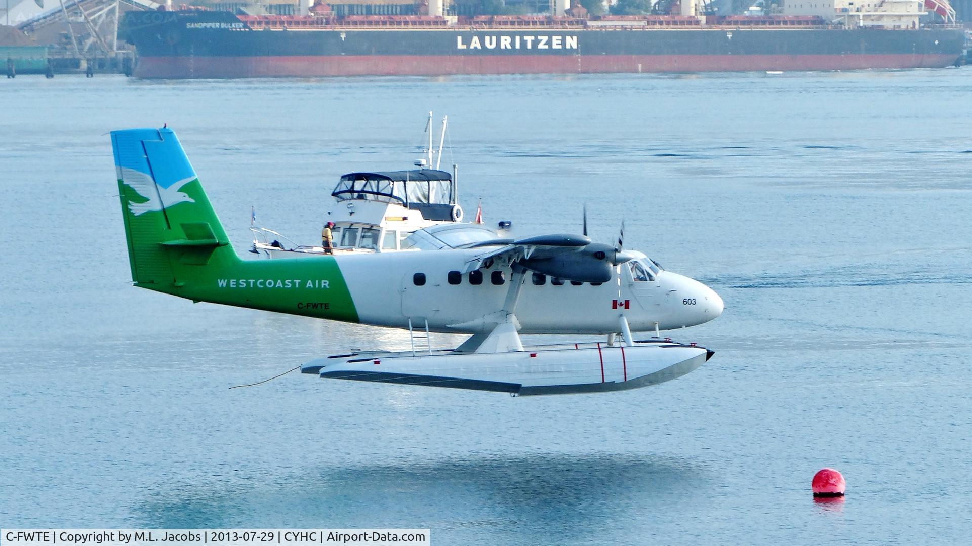 C-FWTE, 1968 De Havilland Canada DHC-6-100 Twin Otter C/N 96, Westcoast Air #603 reaching the landing marker in Coal Harbour.