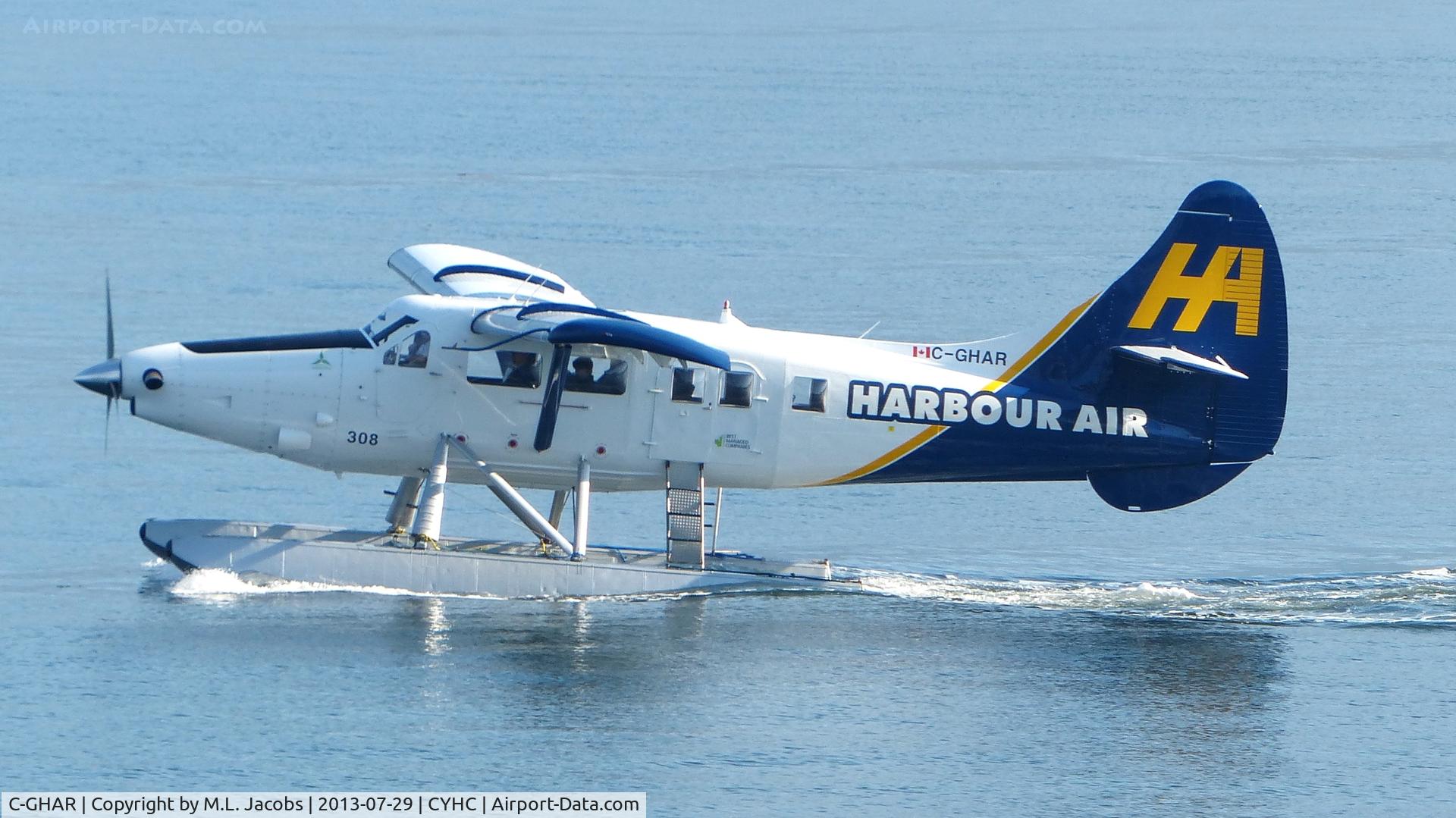 C-GHAR, 1954 De Havilland Canada DHC-3 Otter C/N 42, Harbour Air #308 taxiing to terminal in Coal Harbour.