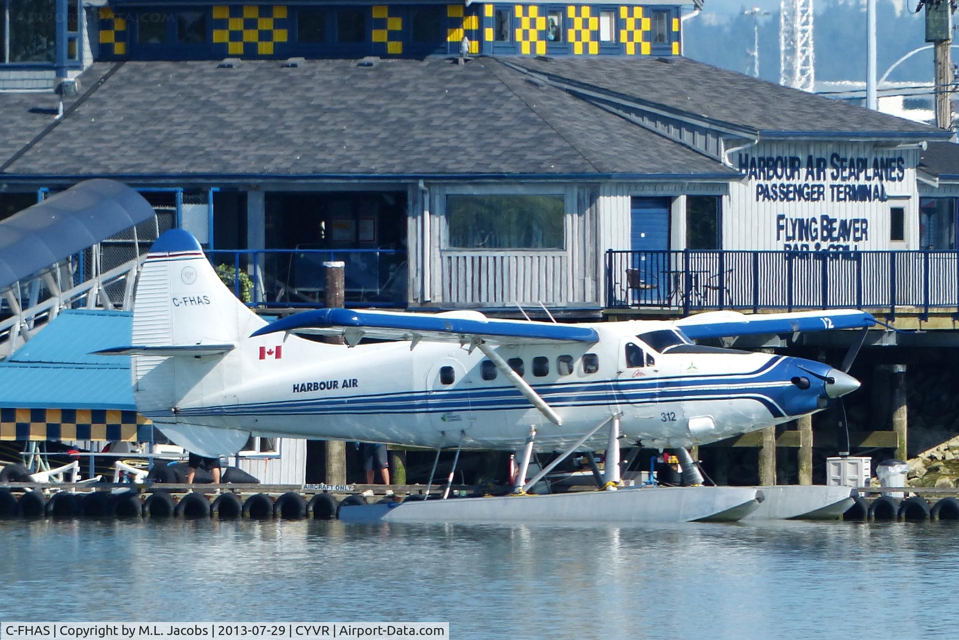 C-FHAS, 1960 De Havilland Canada U-1A  Otter (DHC-3) C/N 382, Harbour Air #312 docked at Fraser River terminal.