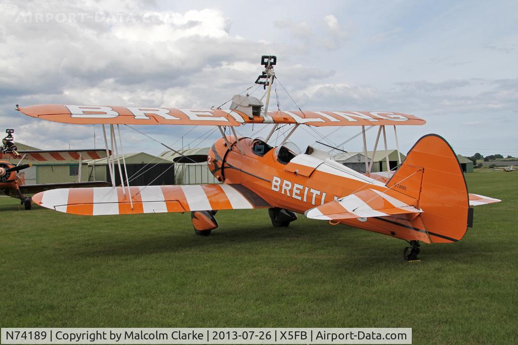 N74189, 1941 Boeing PT-17/R985 Kaydet (A75N1) C/N 75-717, Stearman PT-17-R985 Kaydet (A75N1) during a re-fuelling stop at Fishburn Airfield, July 2013.