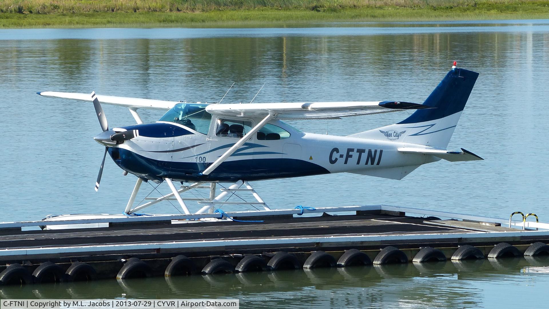 C-FTNI, 1964 Cessna 182G Skylane C/N 18255208, Van City Seaplanes Cessna docked at Fraser River terminal.