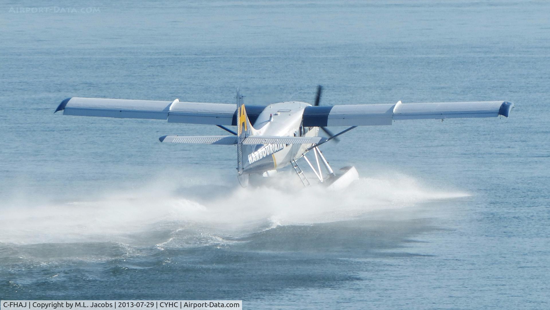 C-FHAJ, 2001 De Havilland Canada DHC-3 Otter C/N 408, Harbour Air #314 taking off from Coal Harbour.