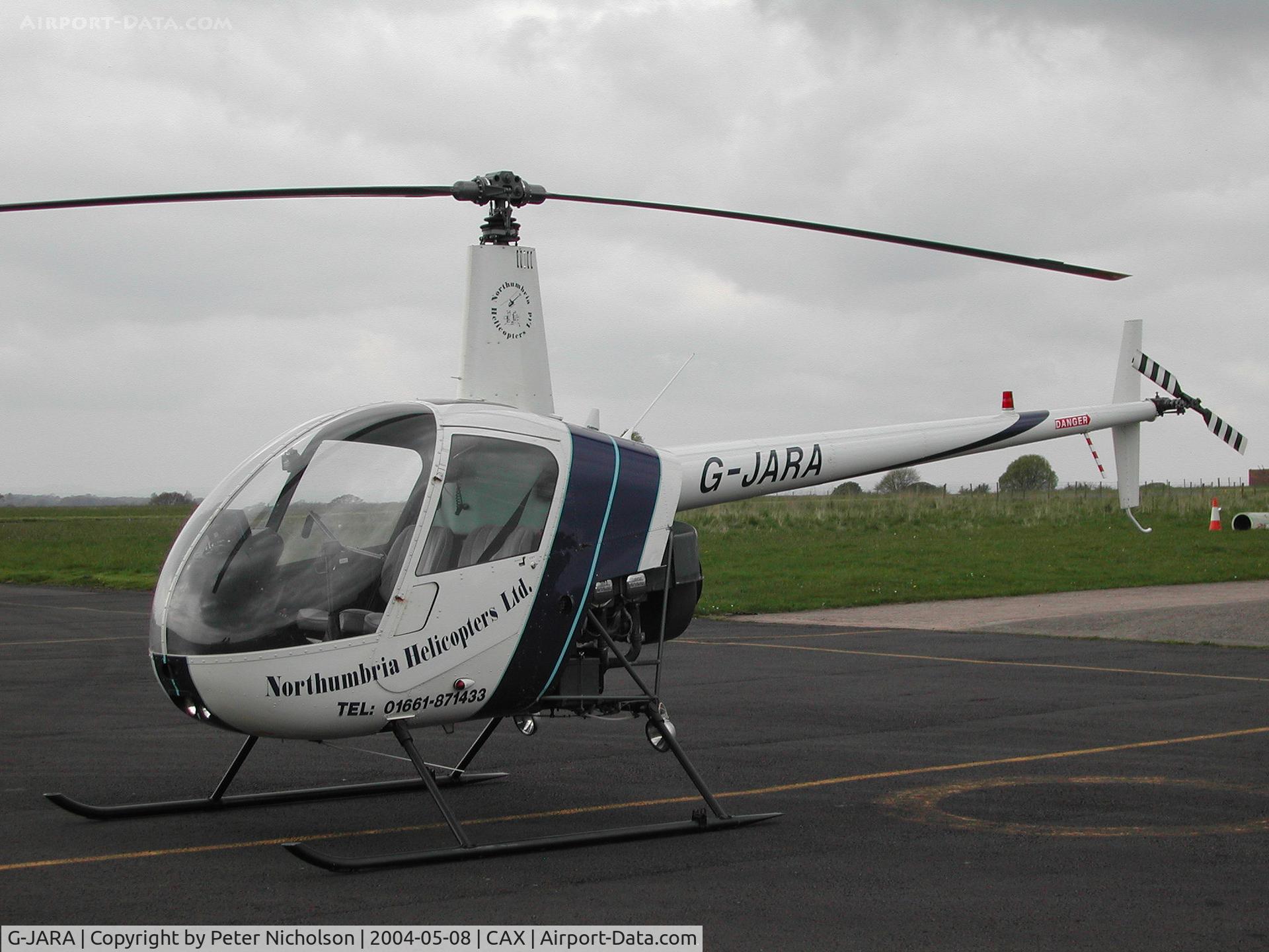 G-JARA, 1991 Robinson R22 Beta C/N 1837, Robinson R22 Beta of Northumbria Helicopters Ltd seen at Carlisle in May 2004.