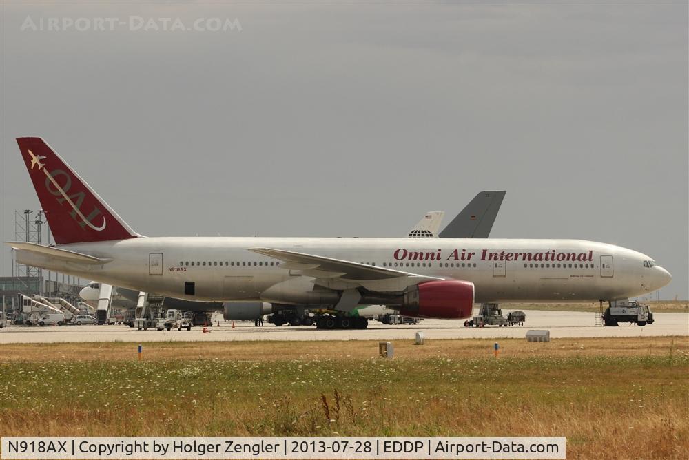 N918AX, 1997 Boeing 777-222 C/N 26935, OmniAir with big equipment on apron 1....