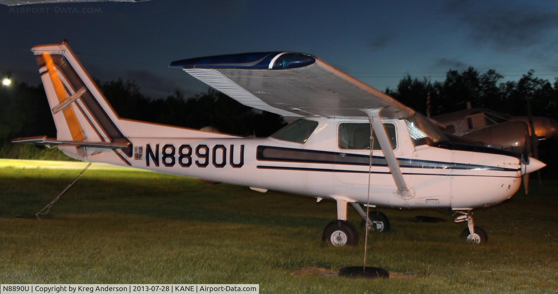 N8890U, 1976 Cessna 150M C/N 15078013, Cessna 150M on a grass pad near Cirrus Flight Ops.