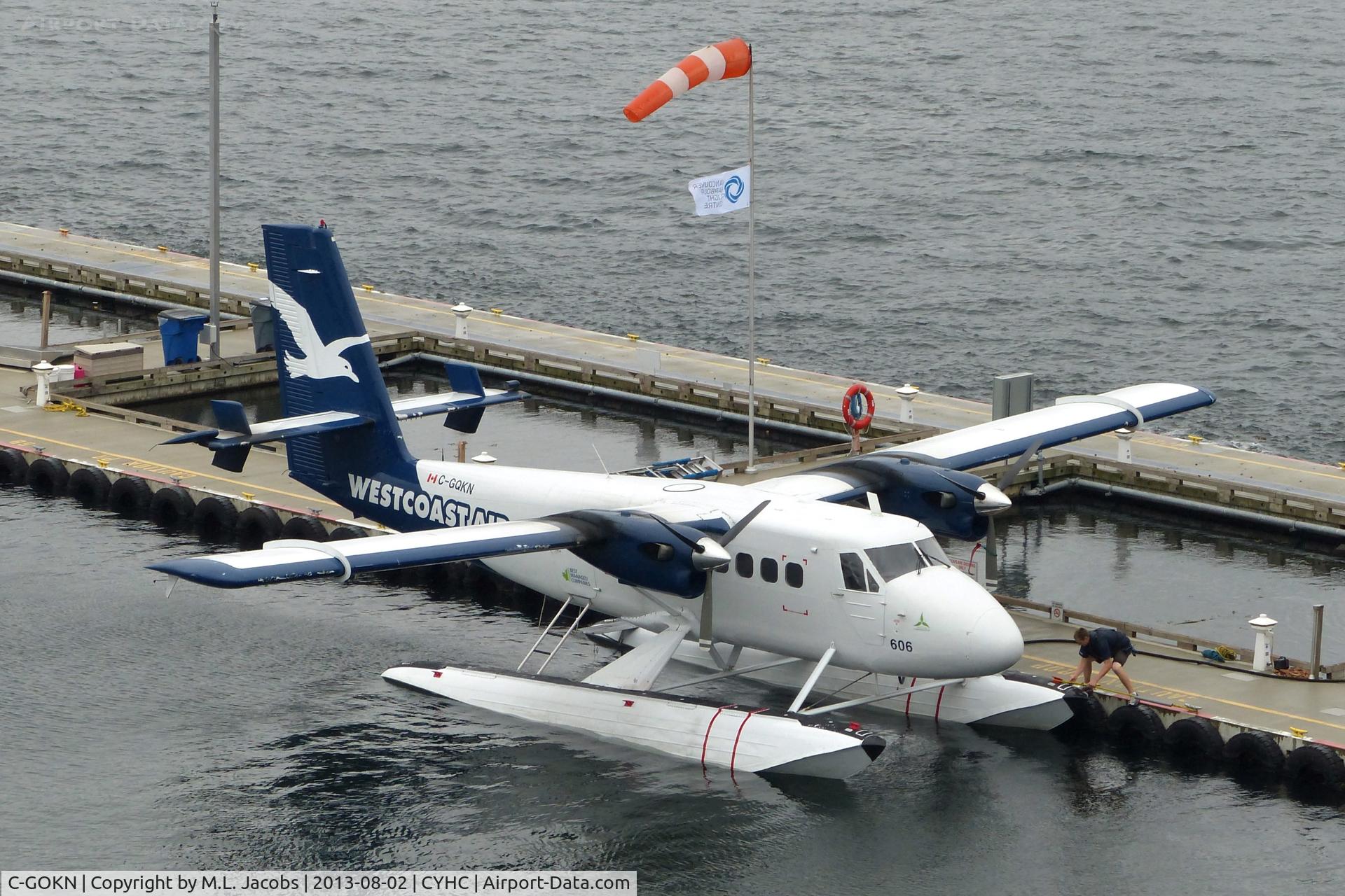 C-GOKN, De Havilland Canada DHC-6-100 Twin Otter C/N 94, Westcoast Air #606 at Harbour Air terminal in Coal Harbour on a rainy morning.
