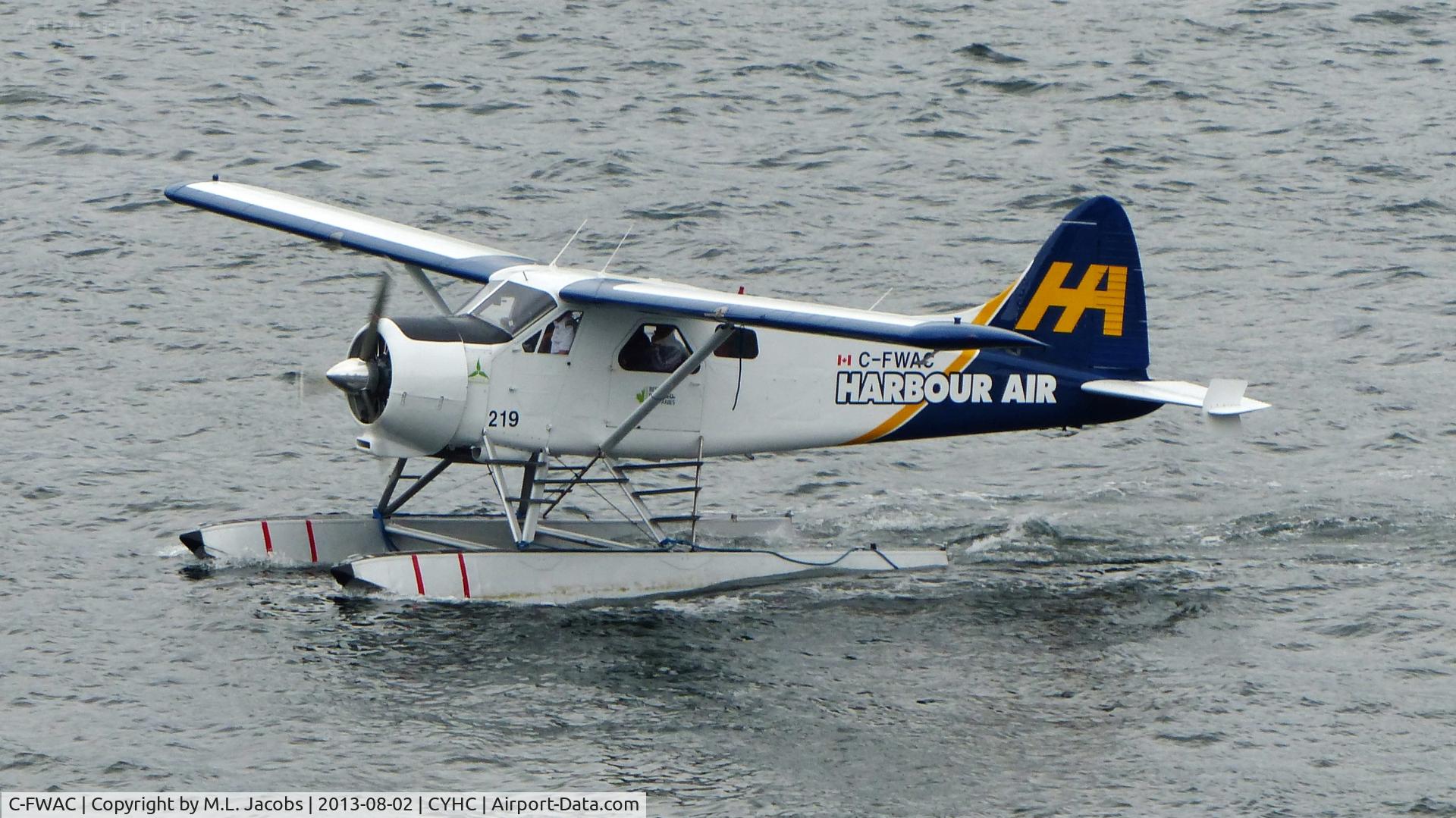 C-FWAC, 1959 De Havilland Canada DHC-2 Beaver Mk. I C/N 1356, Harbour Air #219 taxiing to the terminal in the rain.