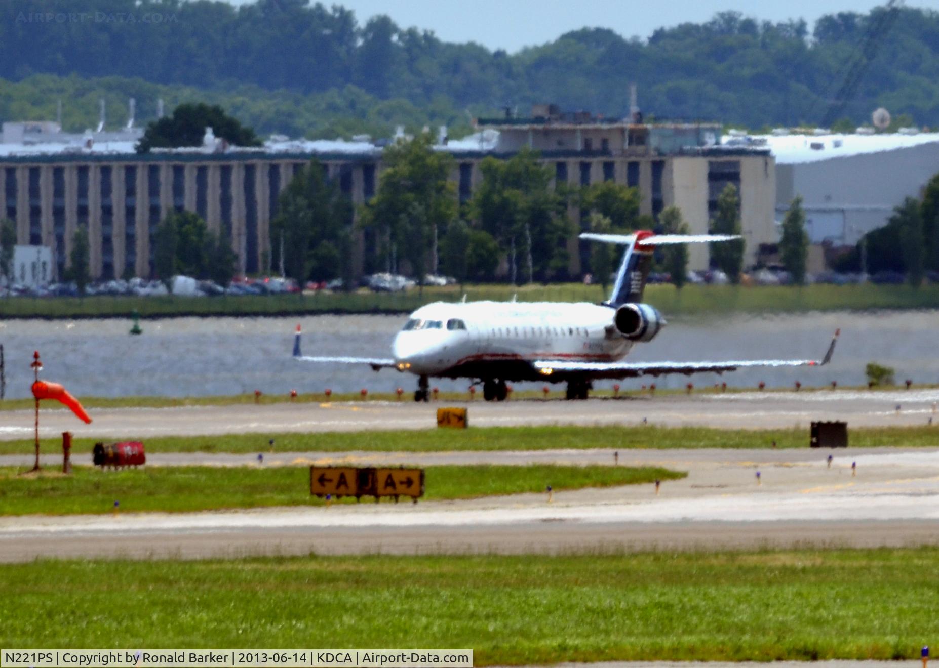 N221PS, 2004 Bombardier CRJ-200LR (CL-600-2B19) C/N 7889, Takeoff DCA