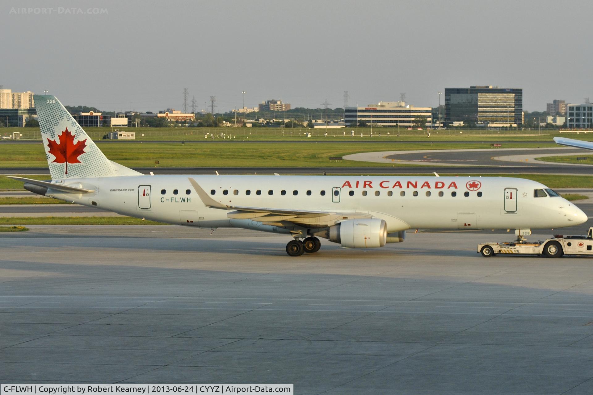 C-FLWH, 2007 Embraer 190AR (ERJ-190-100IGW) C/N 19000094, On tow to parking