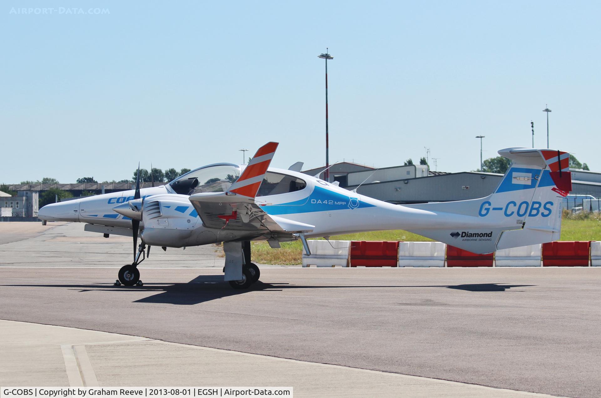 G-COBS, 2011 Diamond DA-42M-NG Twin Star C/N 42.MN020, Parked at Norwich.