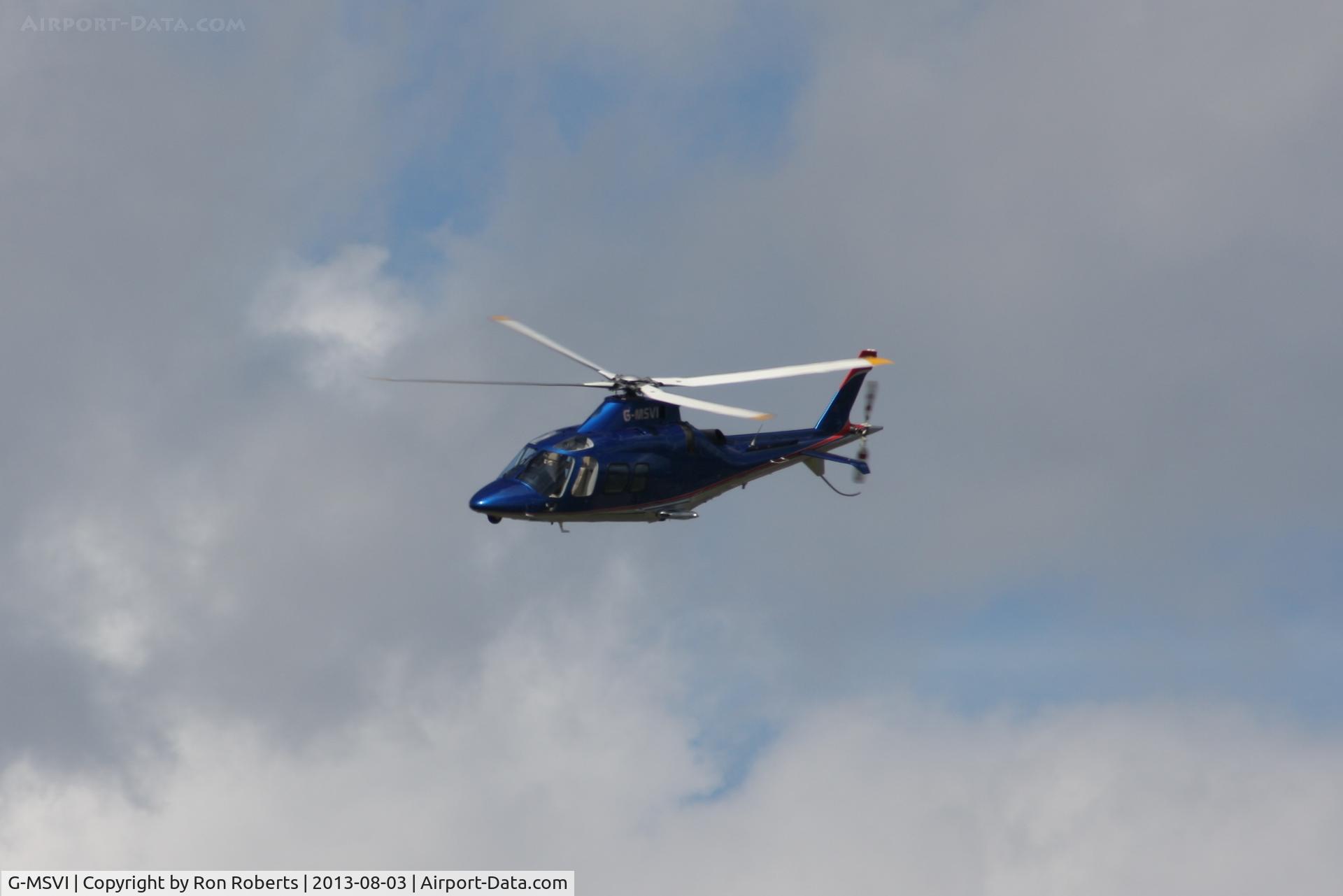 G-MSVI, 2006 Agusta A-109S Grand C/N 22028, Just took off from Oulton Park Race Circuit Cheshire