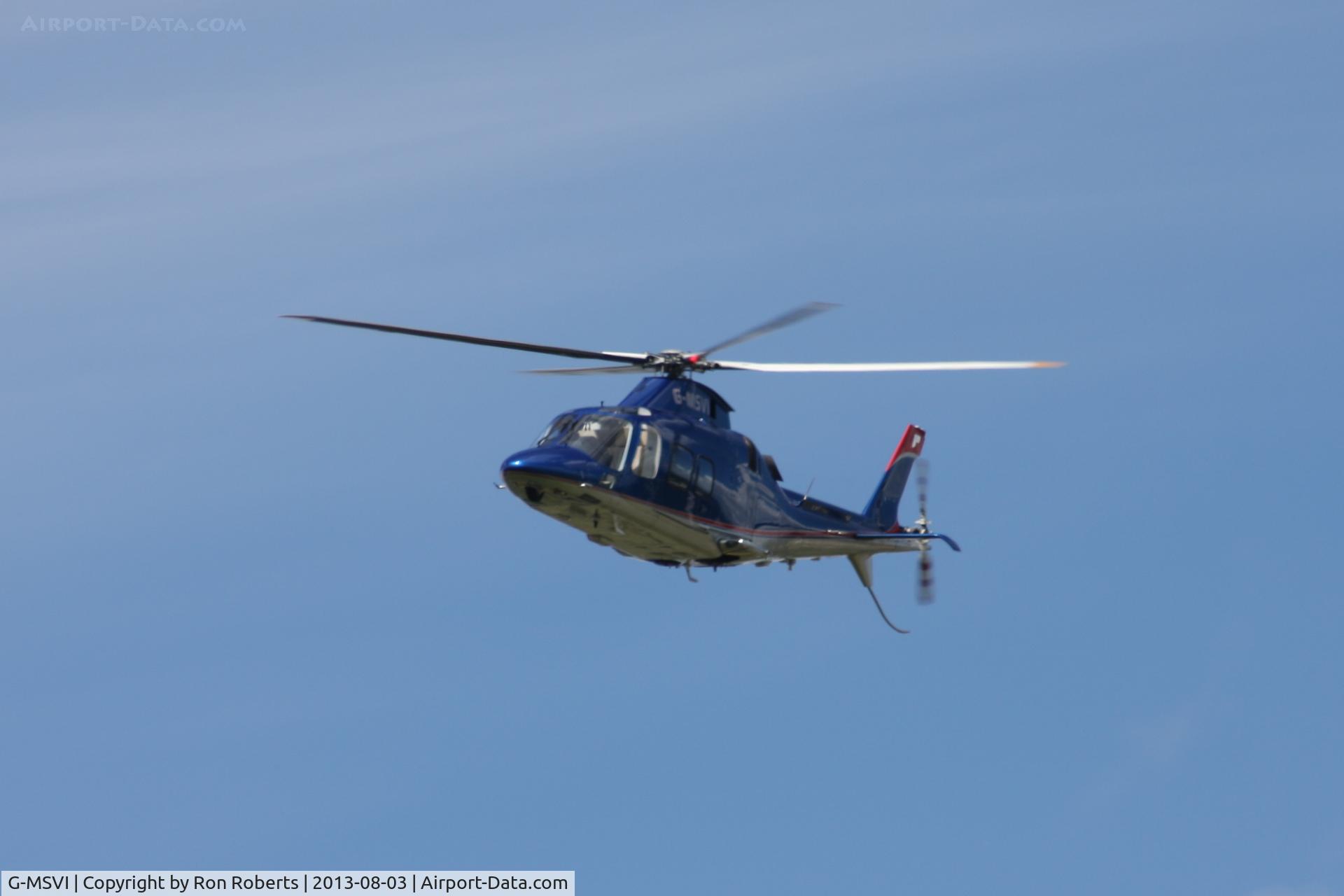 G-MSVI, 2006 Agusta A-109S Grand C/N 22028, Just took off from Oulton Park Race Circuit Cheshire