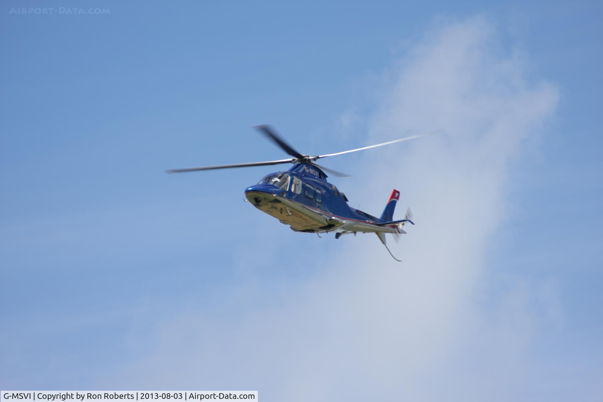 G-MSVI, 2006 Agusta A-109S Grand C/N 22028, Just took off from Oulton Park Race Circuit Cheshire