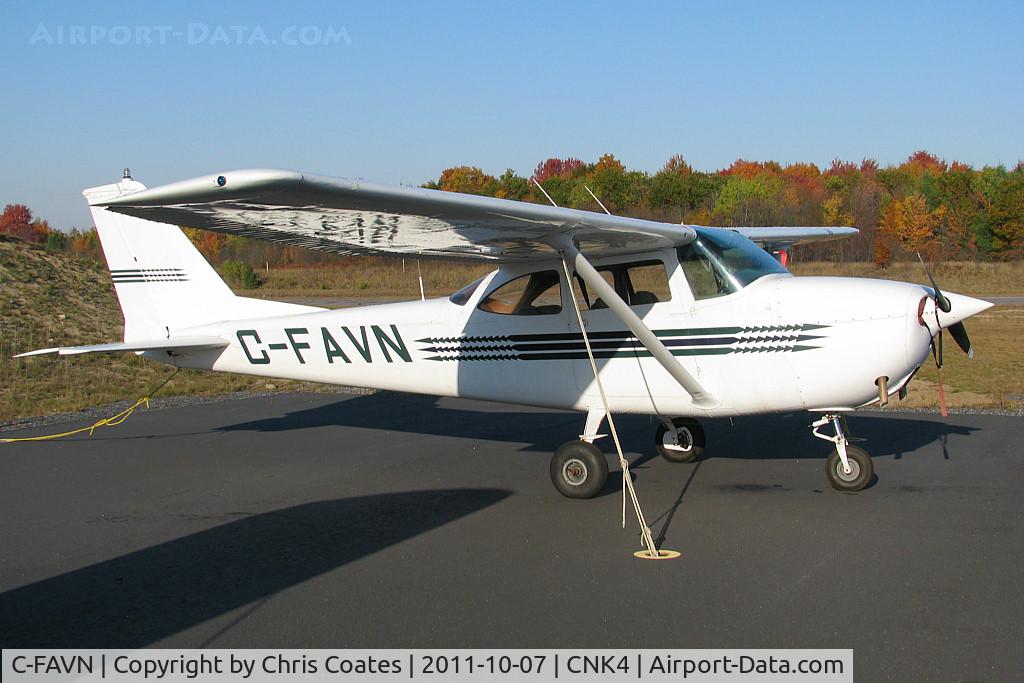 C-FAVN, 1966 Cessna 172G C/N 17253566, Resting on the main ramp with beautiful Fall colours beside the runway. This Skyhawk lives here at the Parry Sound airport.