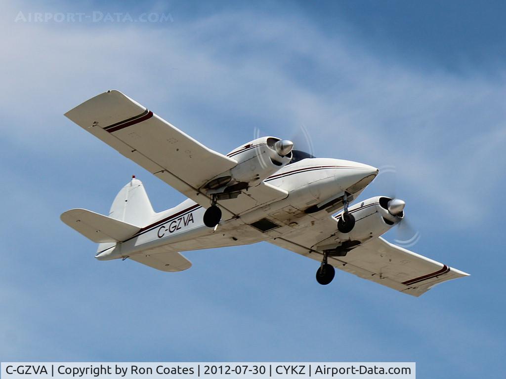 C-GZVA, 1956 Piper PA-23-250 Aztec C/N 23-466, Lifting off runway 15 this 1956 Piper 23A is doing touch and go's at Buttonville Airport (YKZ)
