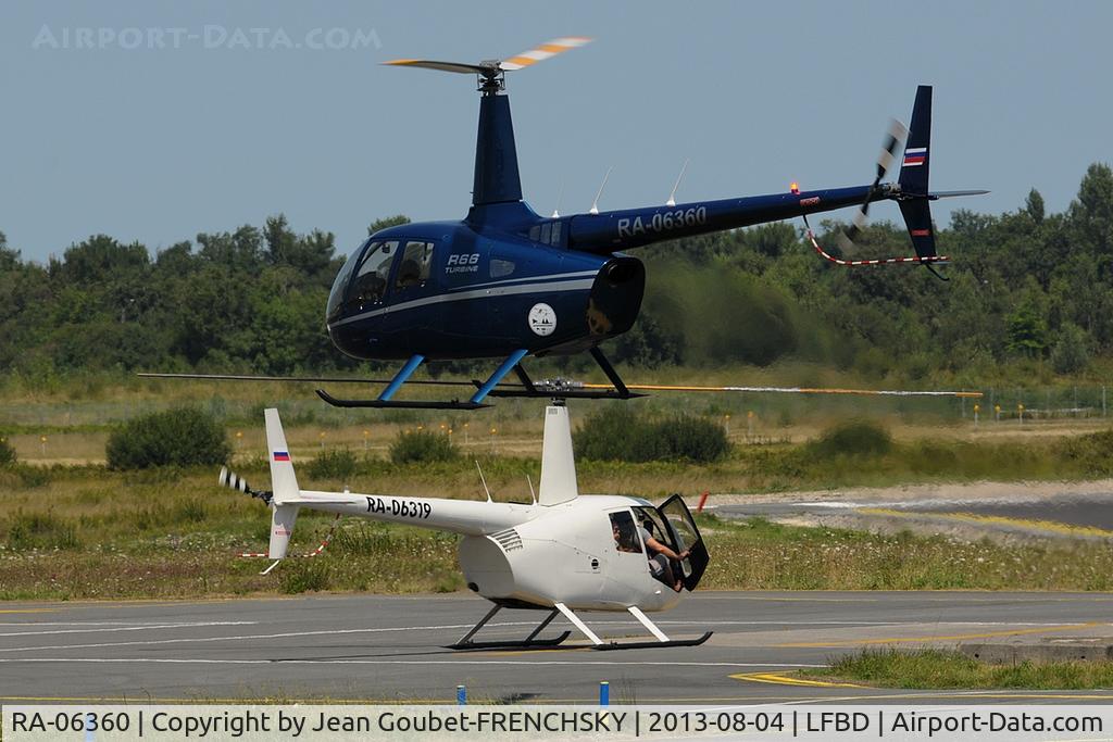 RA-06360, 2012 Robinson R66 Turbine C/N 0168, RAVEN RA-06319 and RA-06360 landing