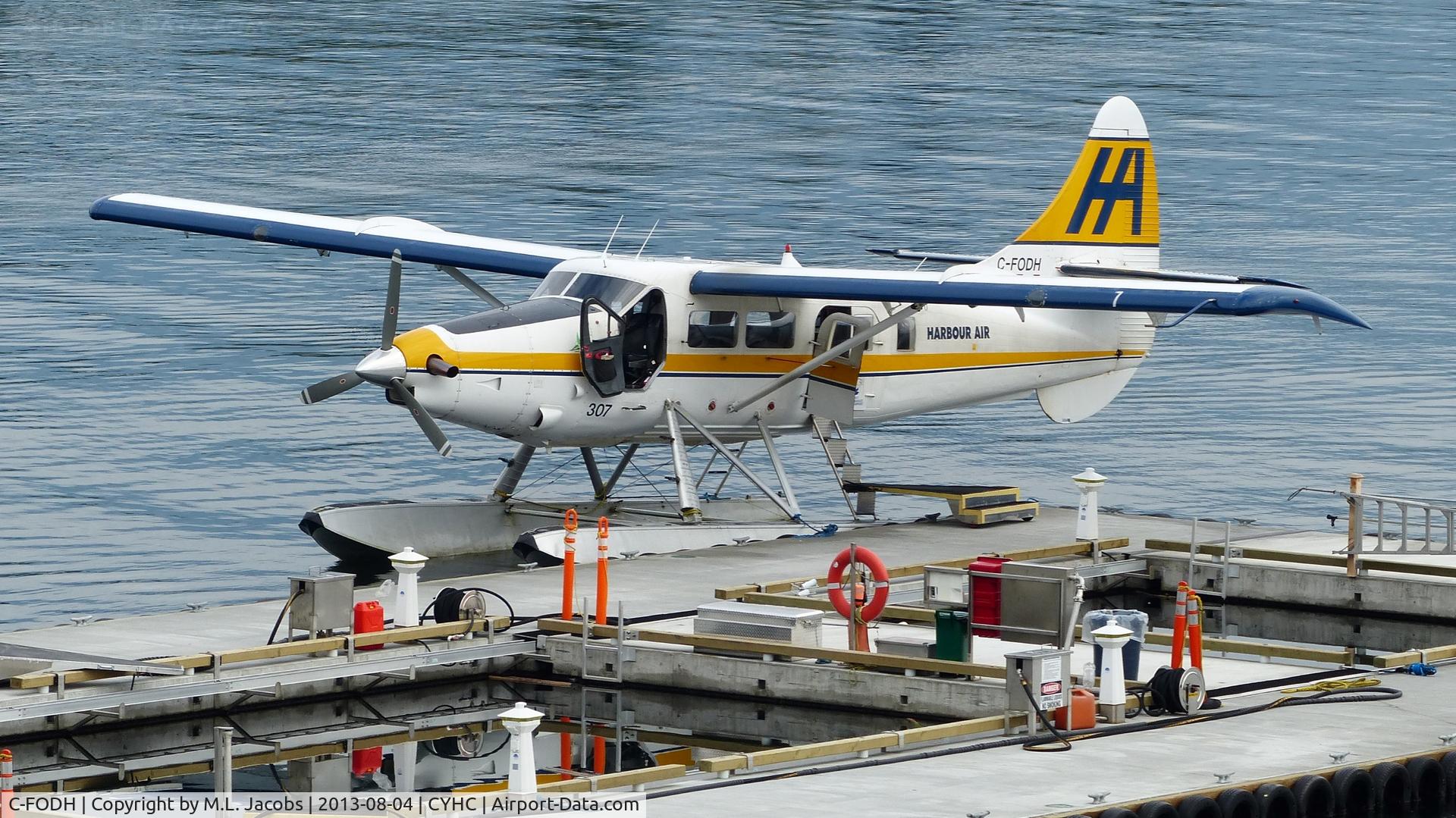 C-FODH, 1952 De Havilland Canada DHC-3T Vazar Turbine Otter Otter C/N 3, Harbour Air #307 recently arrived and unloaded at terminal in Coal Harbour.