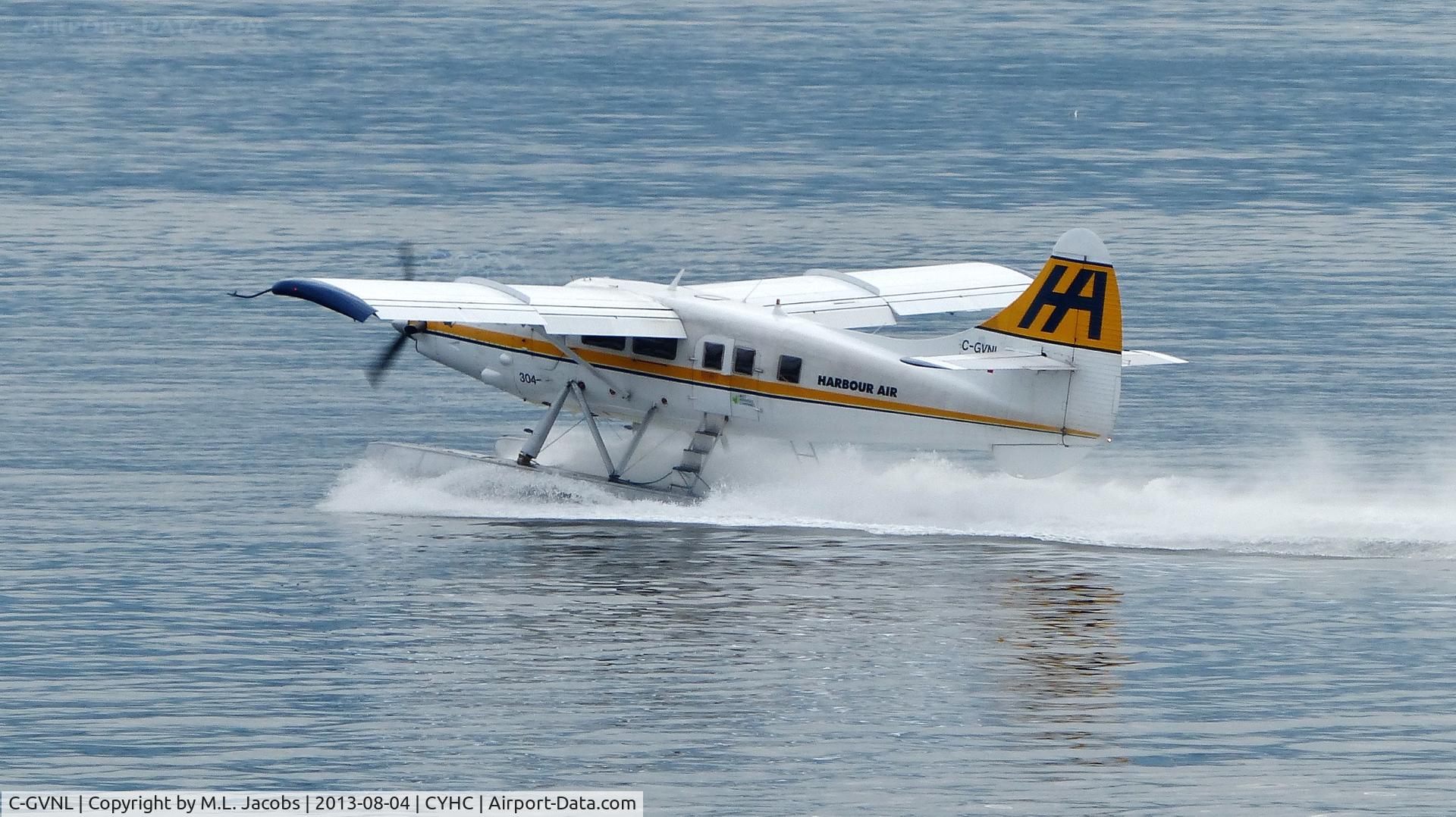 C-GVNL, 1956 De Havilland Canada DHC-3 Otter C/N 105, Harbour Air #304 taking off in Coal Harbour.