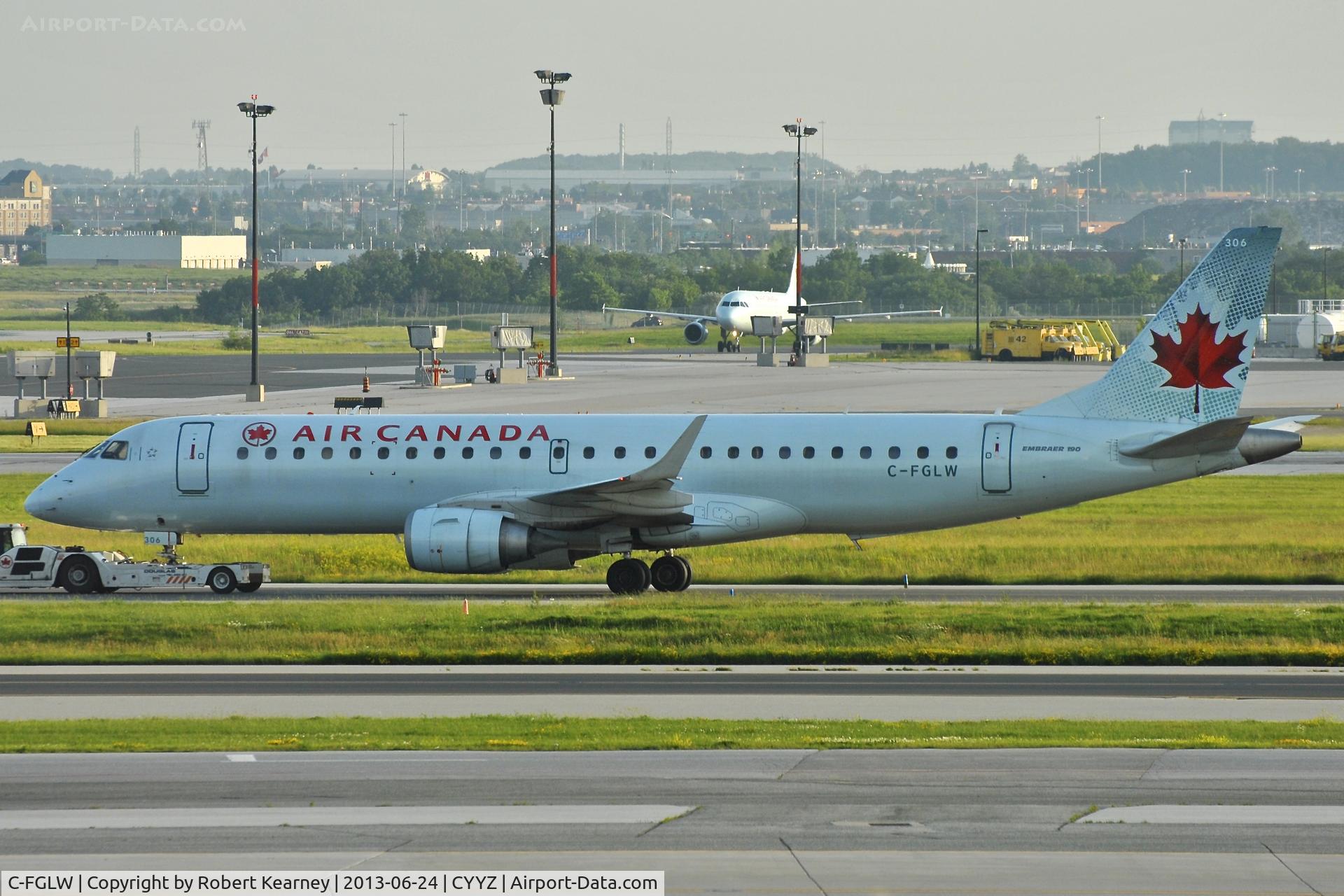 C-FGLW, 2006 Embraer 190AR (ERJ-190-100IGW) C/N 19000022, On tow around to parking