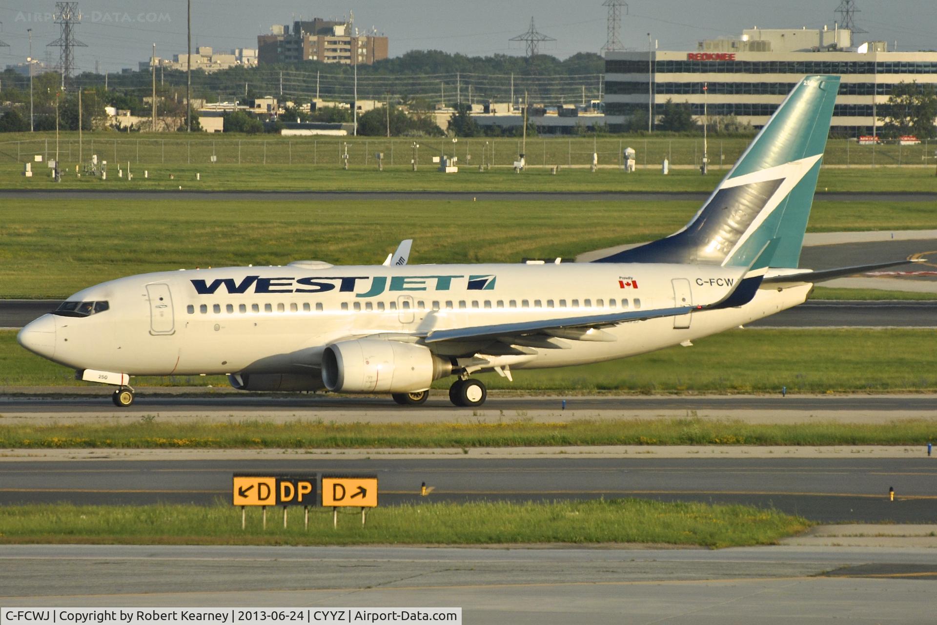 C-FCWJ, 2008 Boeing 737-7CT C/N 35086, Taxiing out for departure